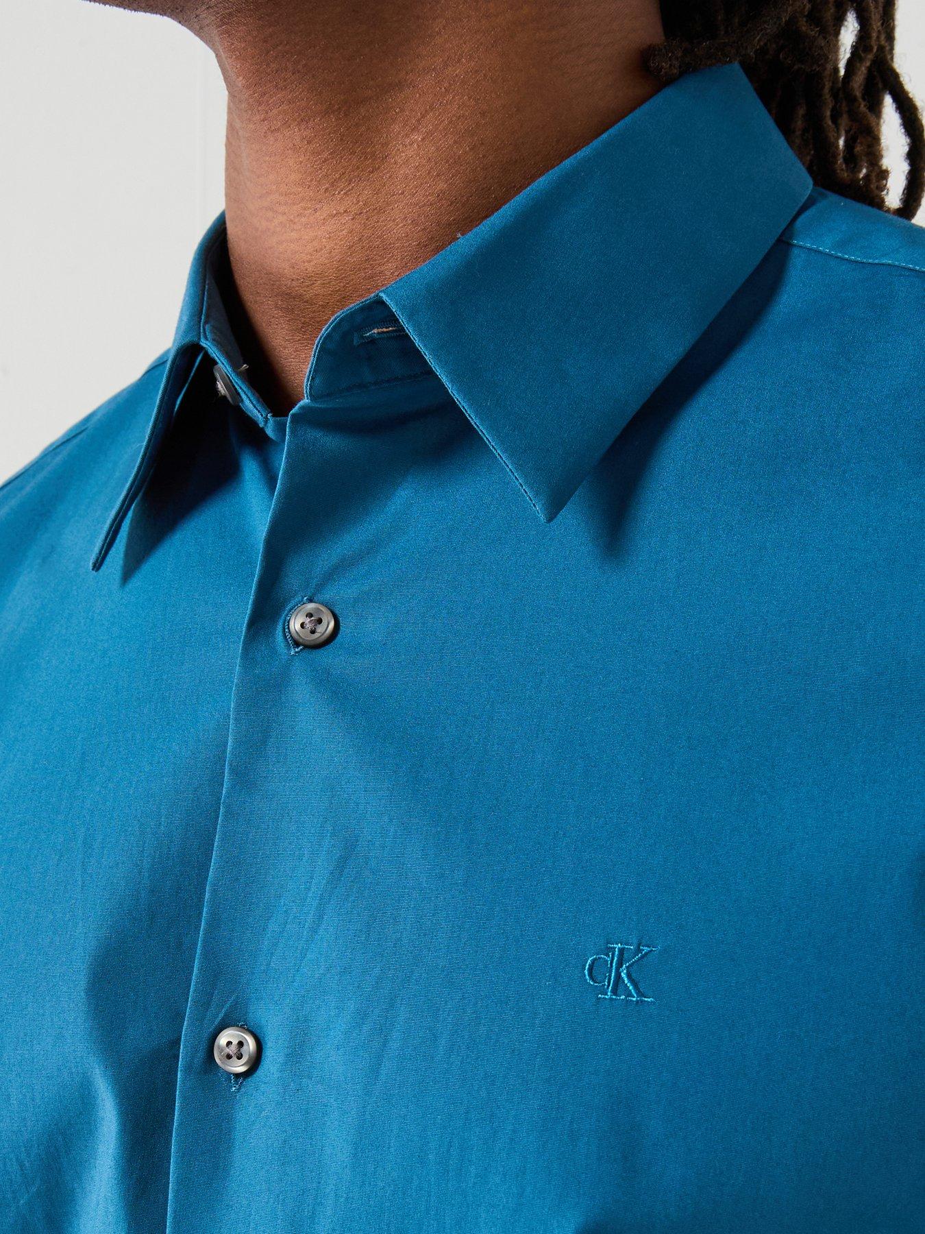  image of calvin-klein-long-sleeve-solid-stretch-slim-fit-shirt-blue