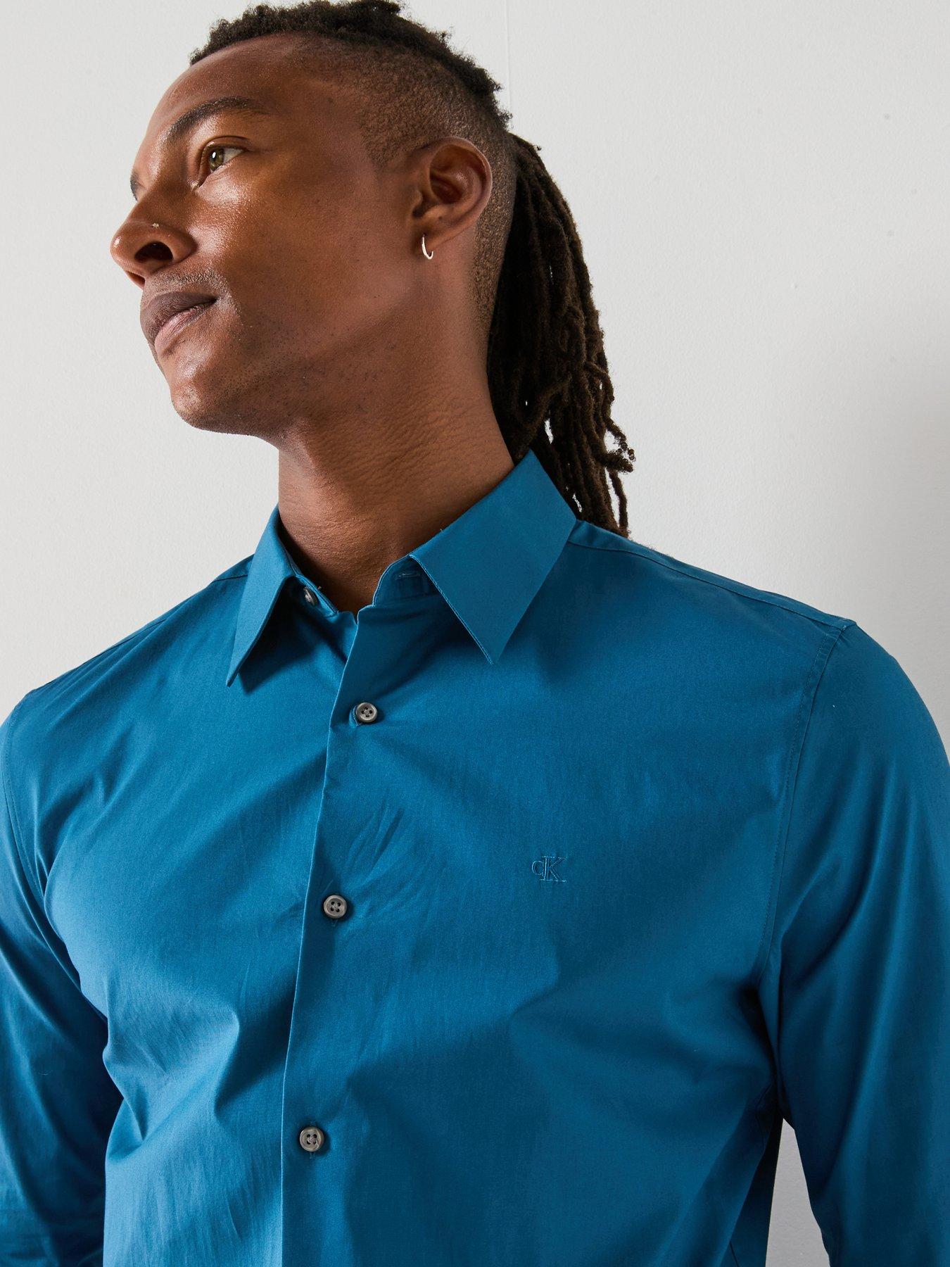  image of calvin-klein-long-sleeve-solid-stretch-slim-fit-shirt-blue