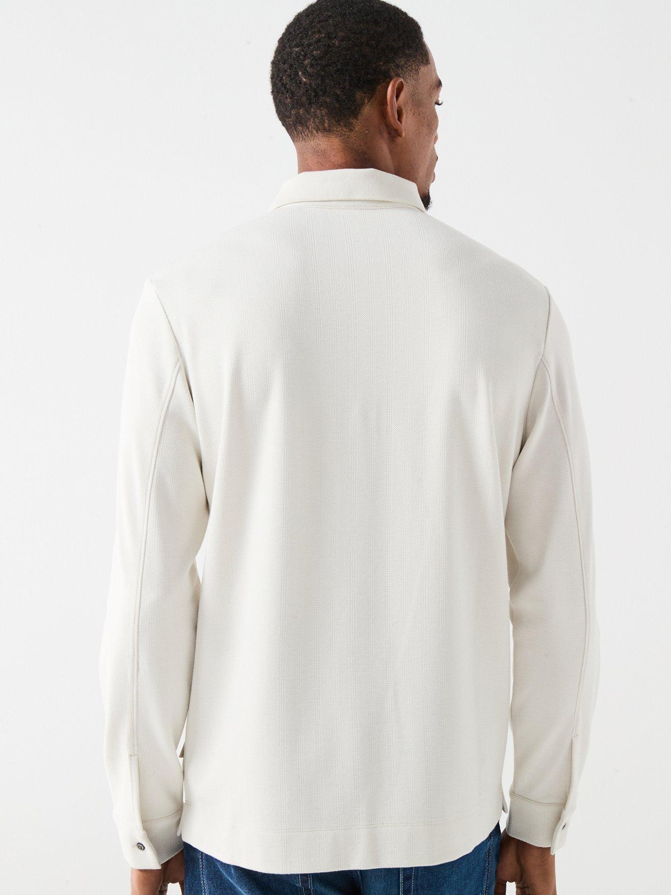  image of calvin-klein-long-sleeve-jacquard-wool-knitted-polo-shirt-cream