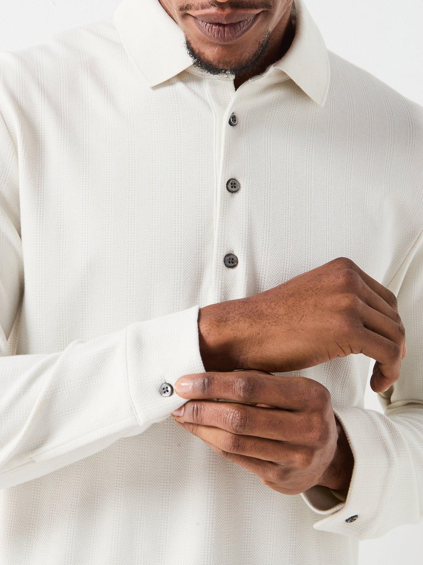  image of calvin-klein-long-sleeve-jacquard-wool-knitted-polo-shirt-cream