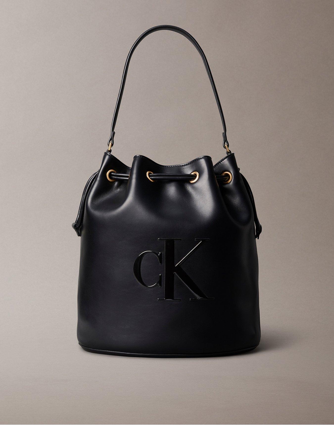 Image 1 of 4 of Calvin Klein Raised Ck Logo Large Bucket Bag - Black