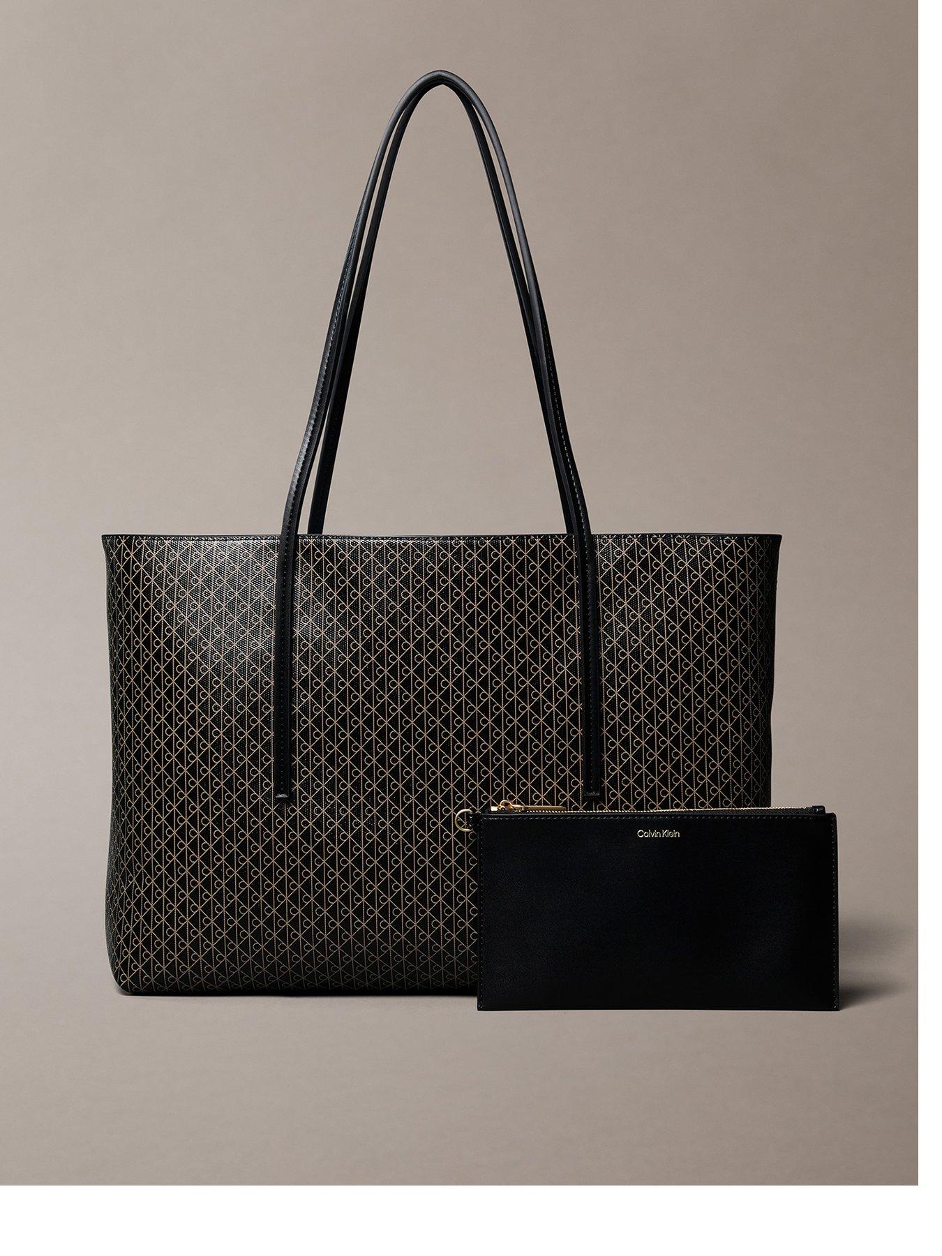 Image 1 of 5 of Calvin Klein Coated Emblem Print Pouch Tote Bag - Black