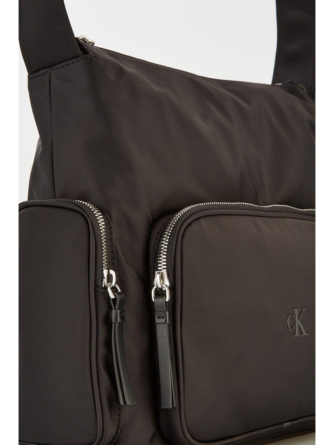 Image 3 of 4 of Calvin Klein Nylon Satchelsea Boot With Side Pockets - Black