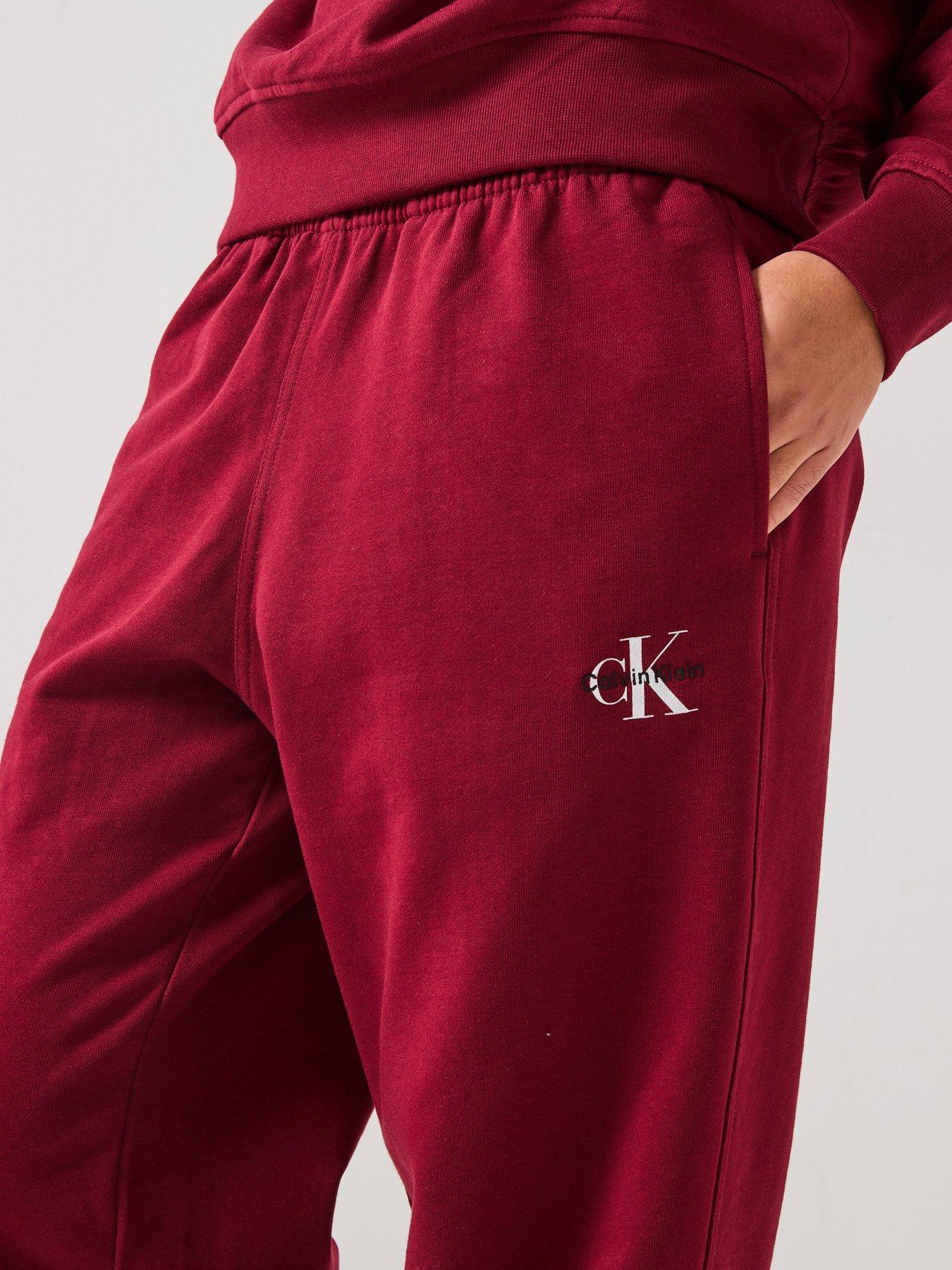  image of calvin-klein-jeans-monologo-cuffed-joggers-red