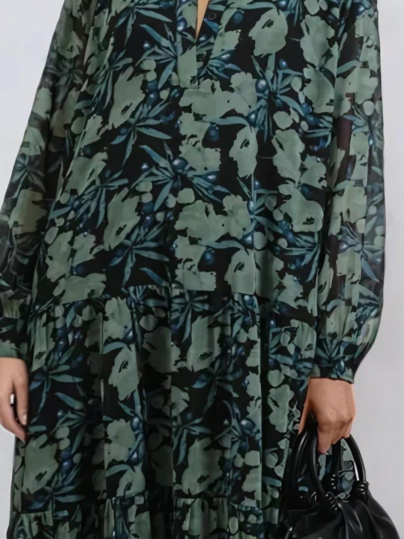  image of religion-sunset-maxi-dress-with-tiered-skirt-in-green-floral-green