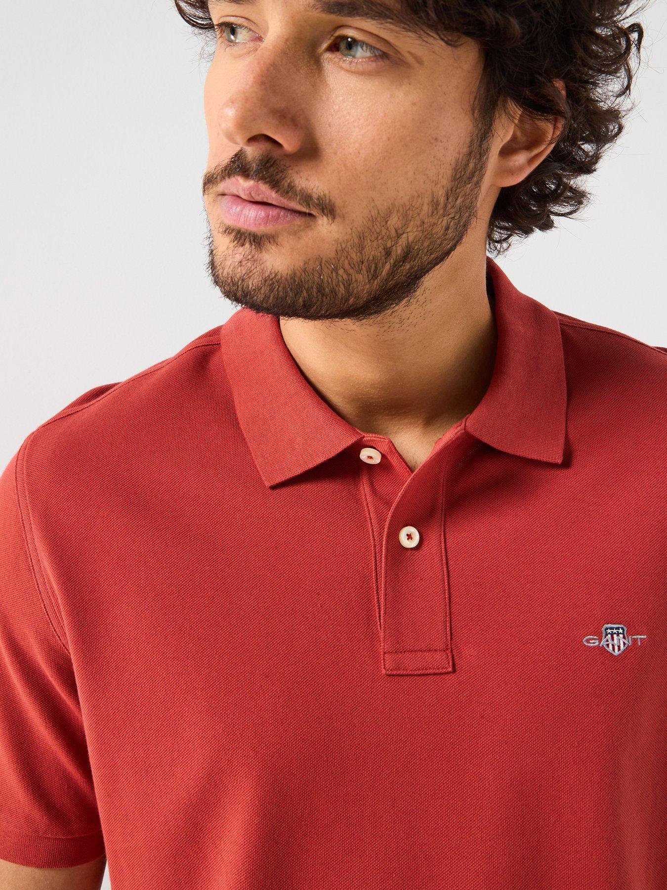  image of gant-regular-fit-shield-pique-polo-shirt-orange