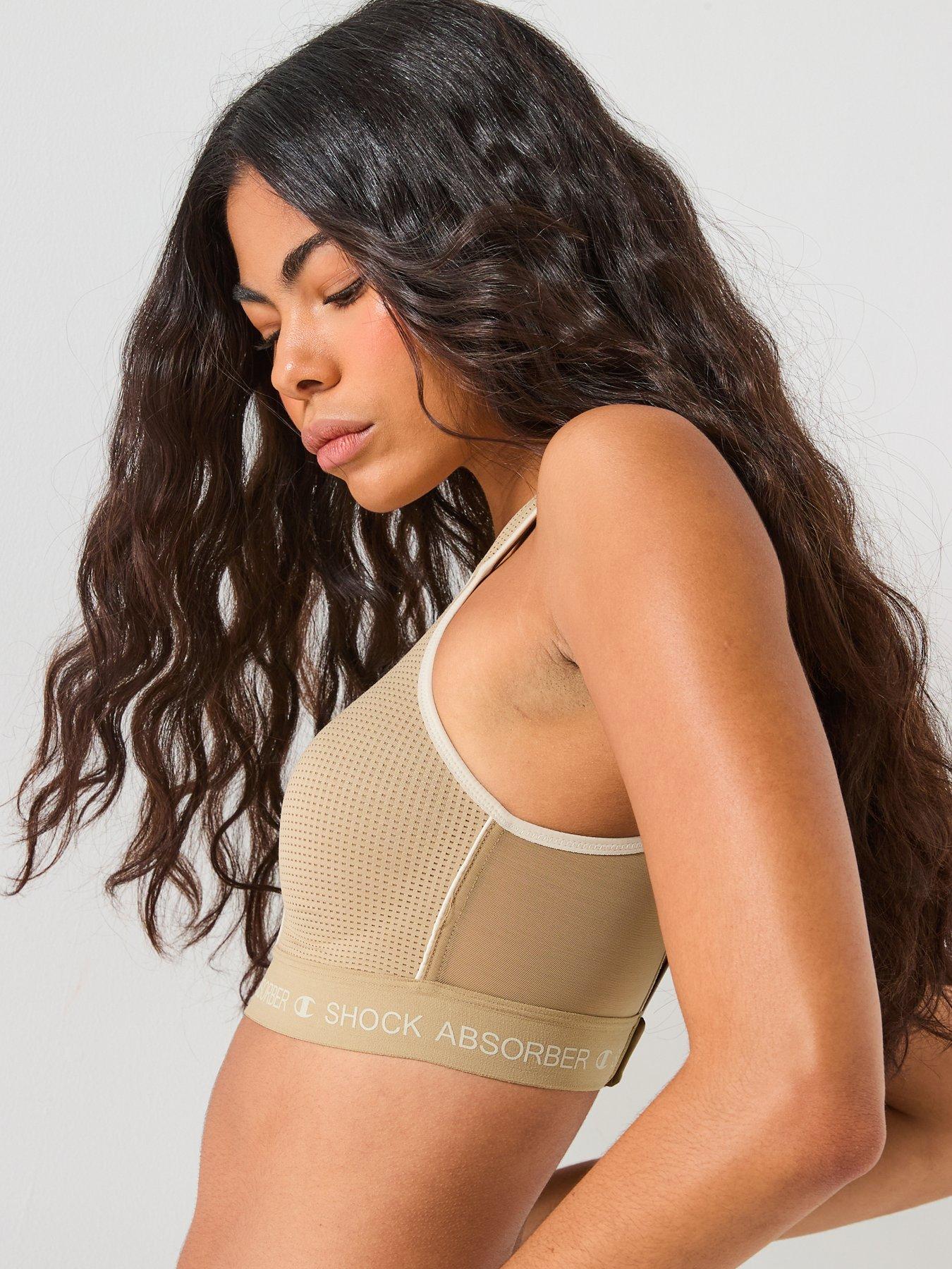  image of shock-absorber-womens-ultimate-run-bra-padded-green