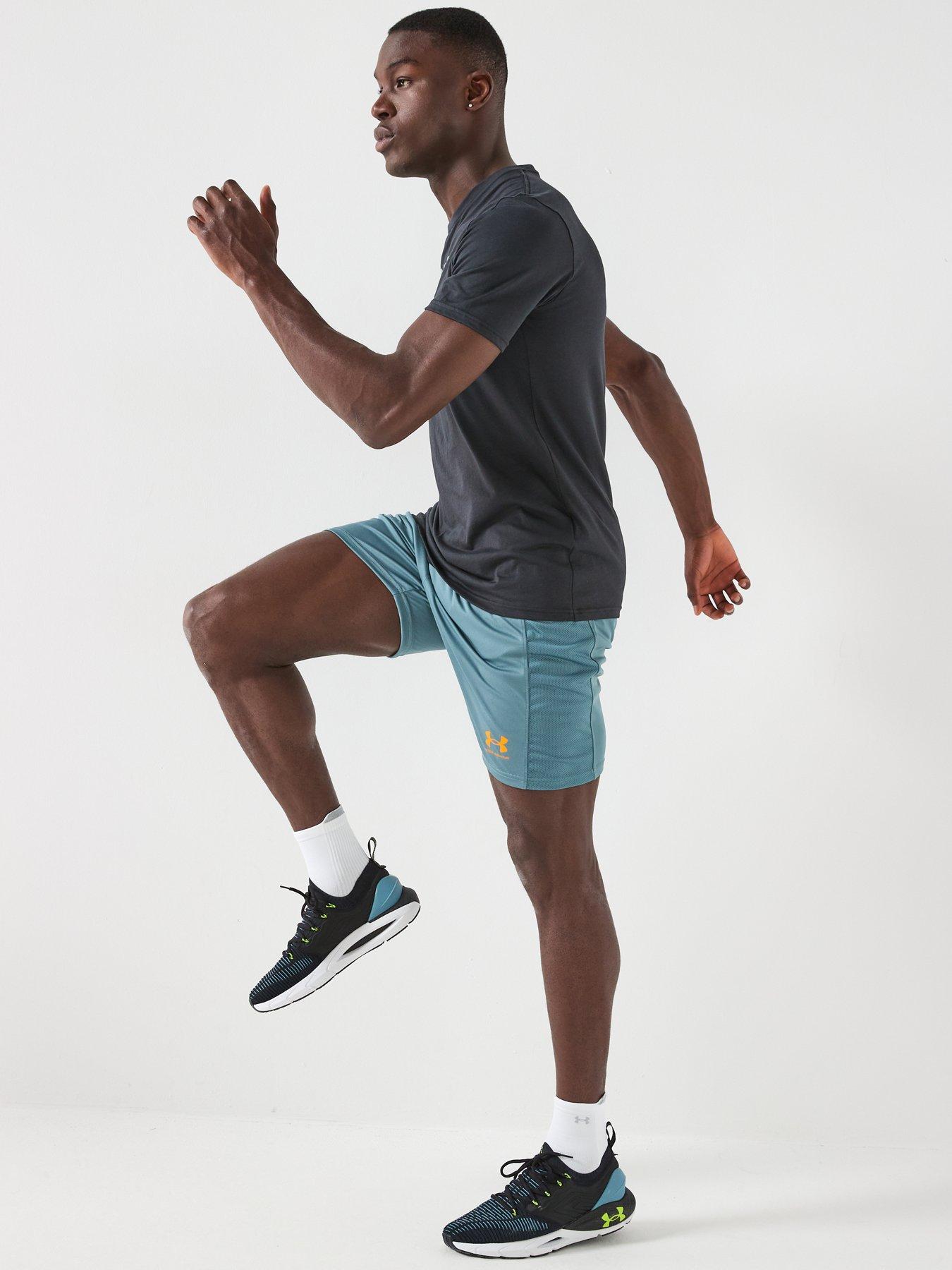  image of under-armour-mens-challenger-train-shorts-green