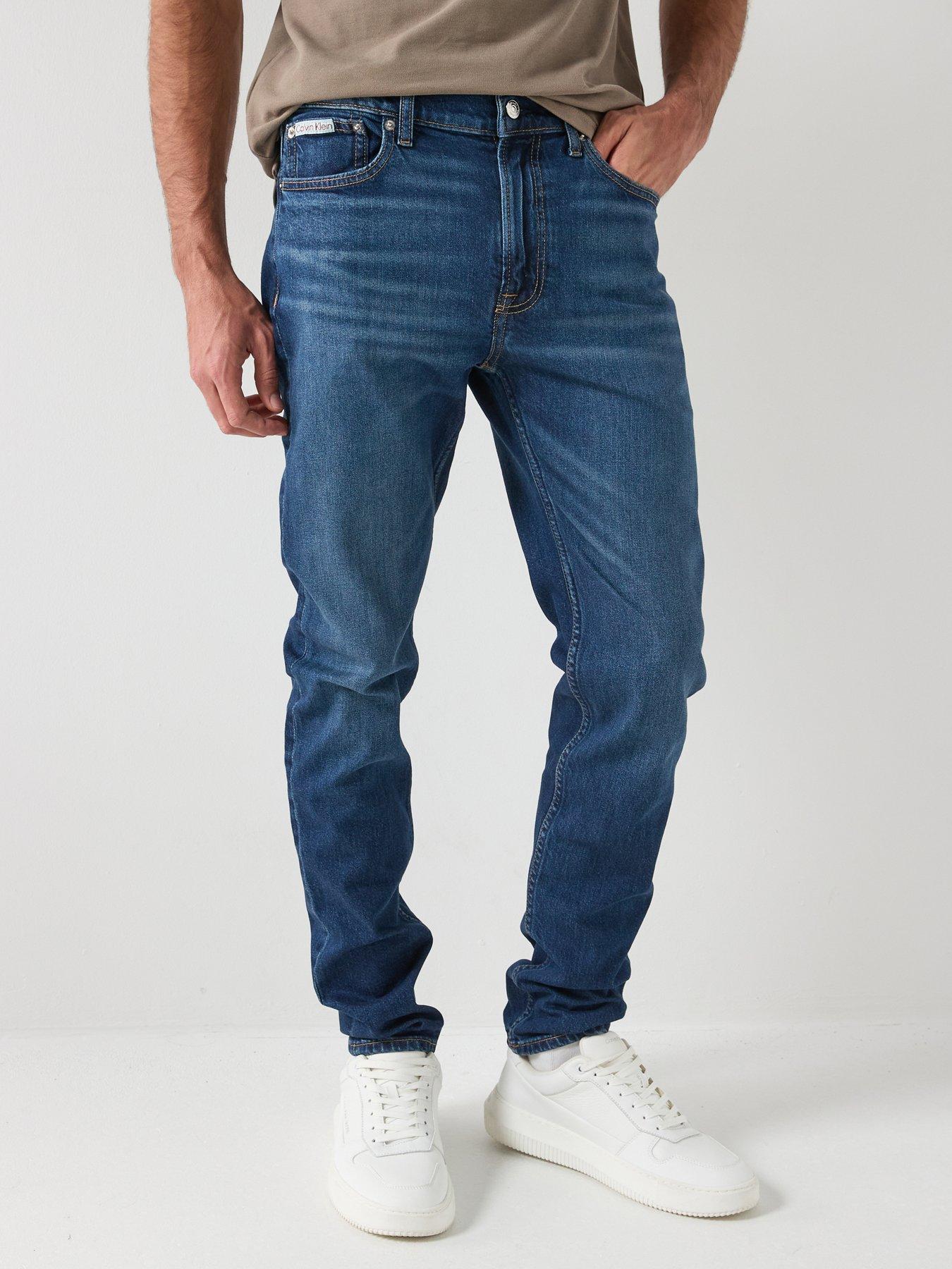  image of calvin-klein-jeans-slim-taper-oil-slick-jeans-dark-blue