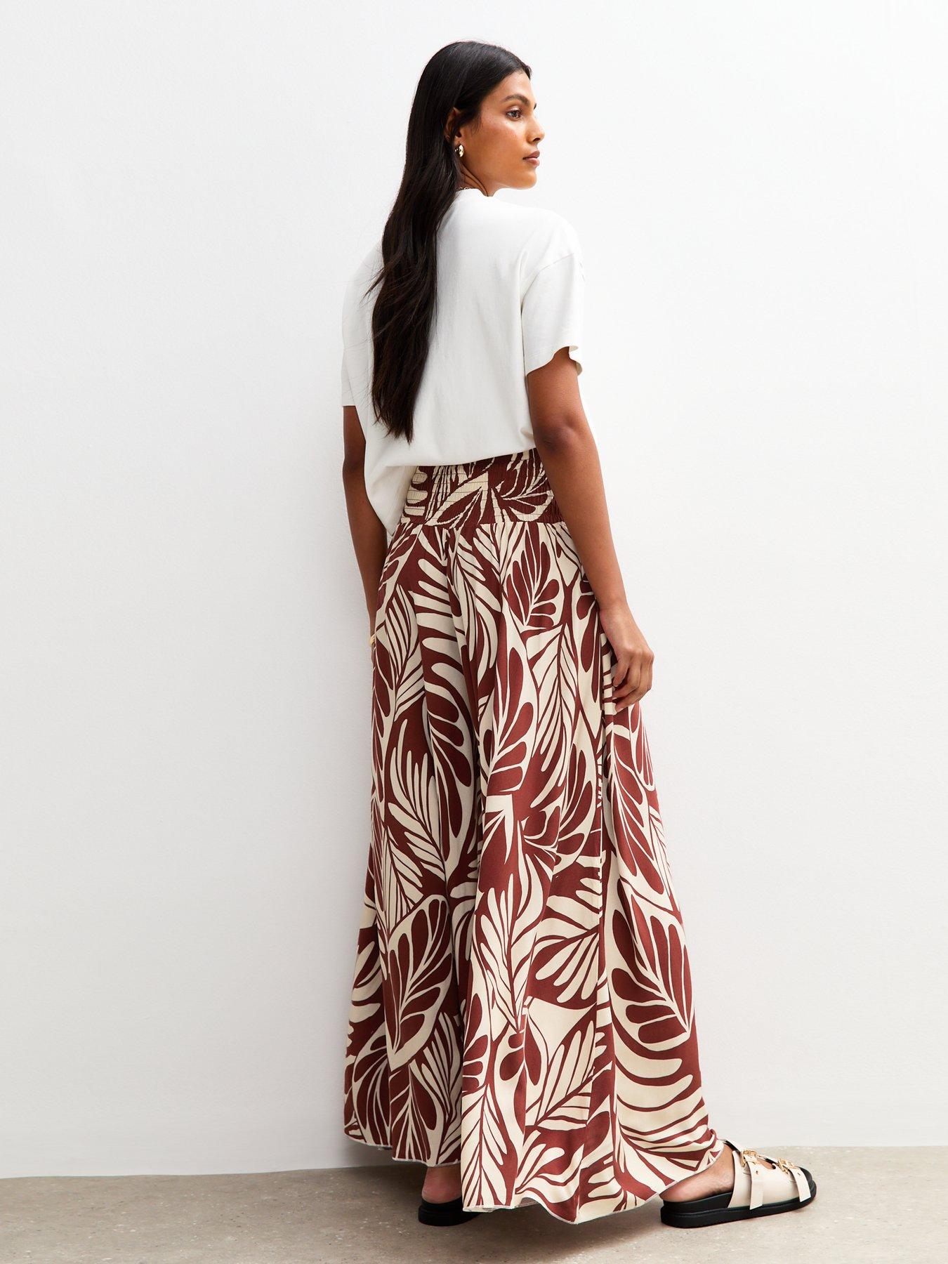Image 2 of 4 of New Look Brown Leaf Print Palazzo Trousers