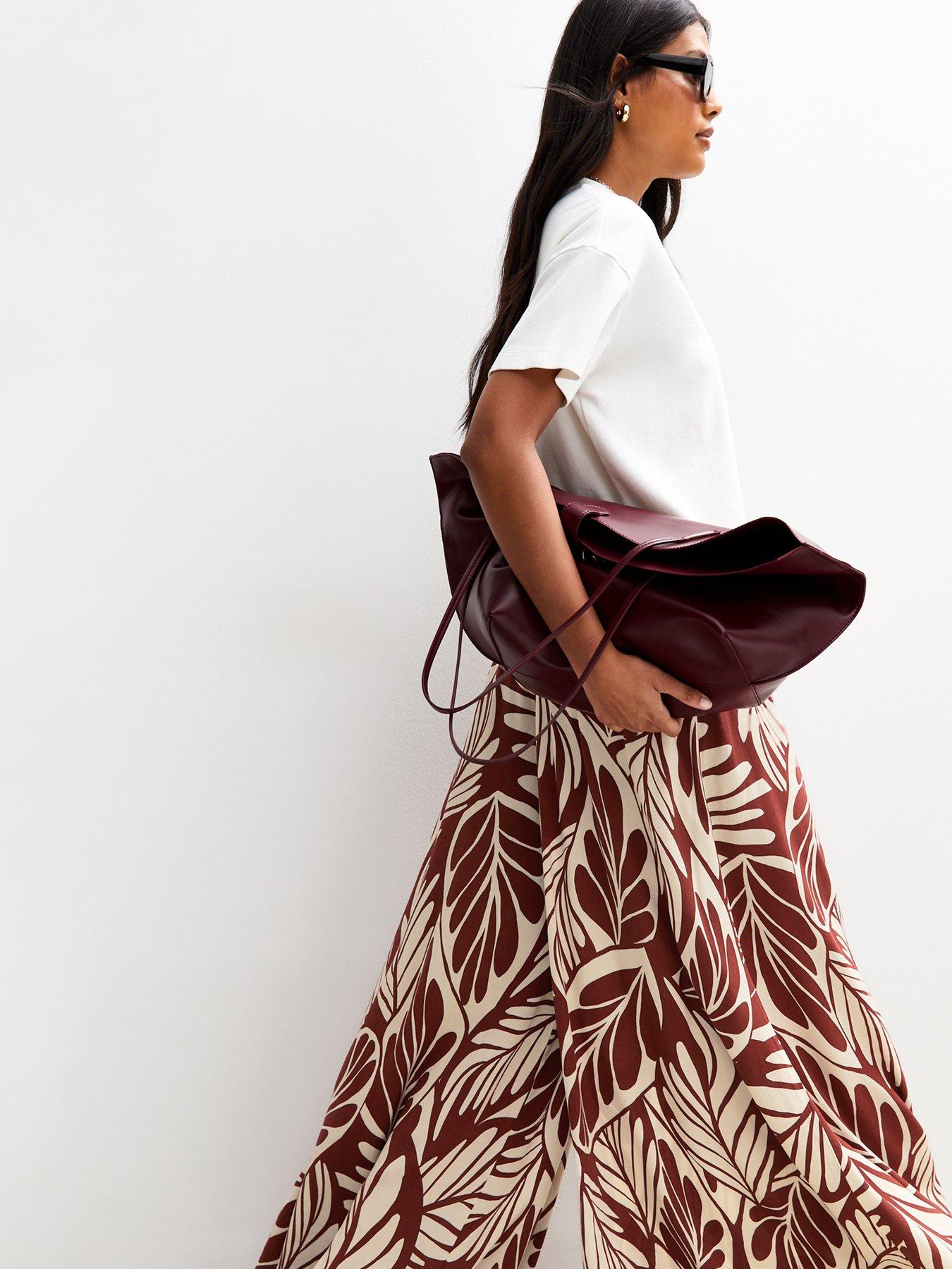 Image 3 of 4 of New Look Brown Leaf Print Palazzo Trousers