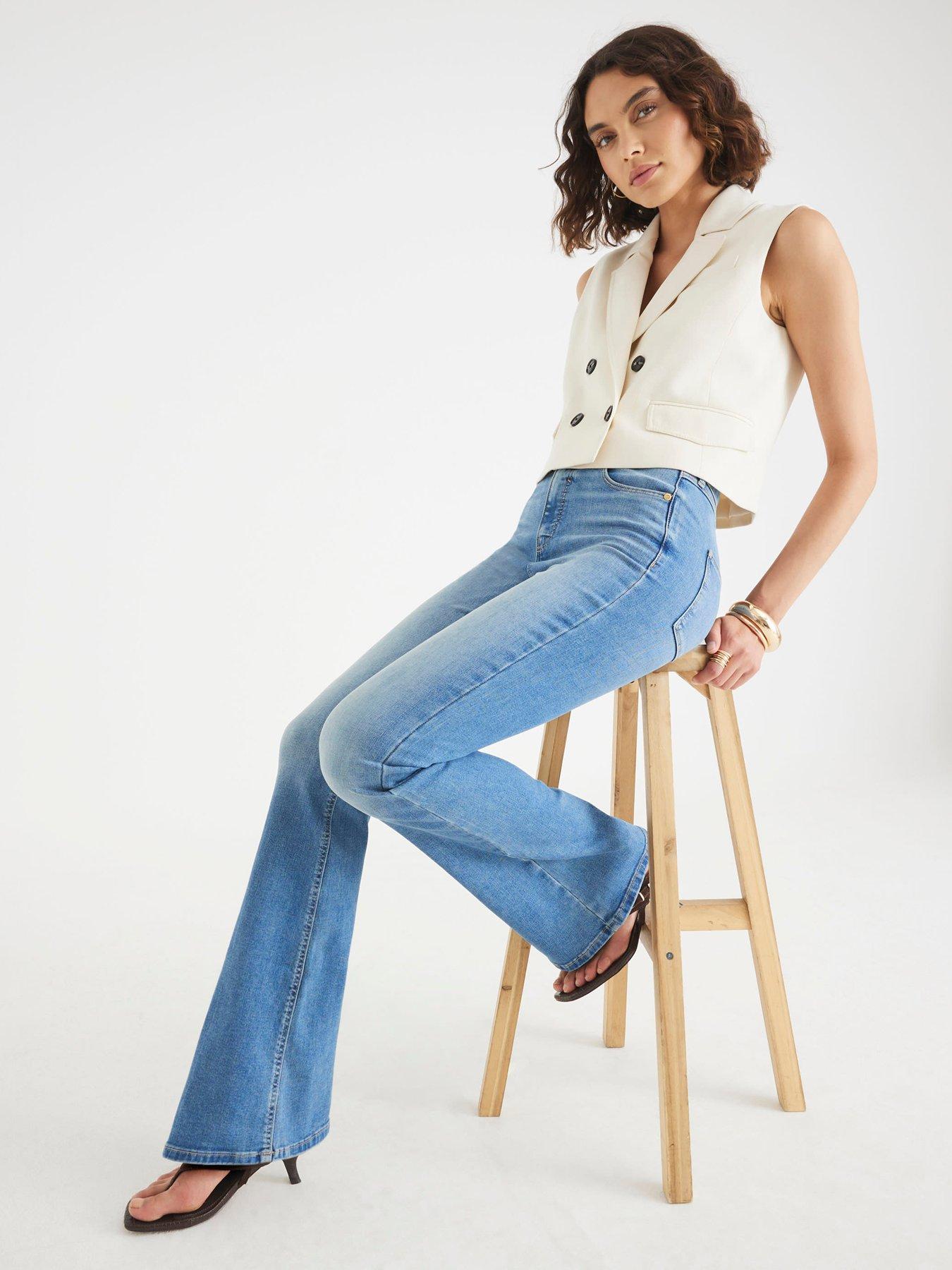 Image 4 of 4 of River Island Sculpt Flare Jeanette Jeans - Blue