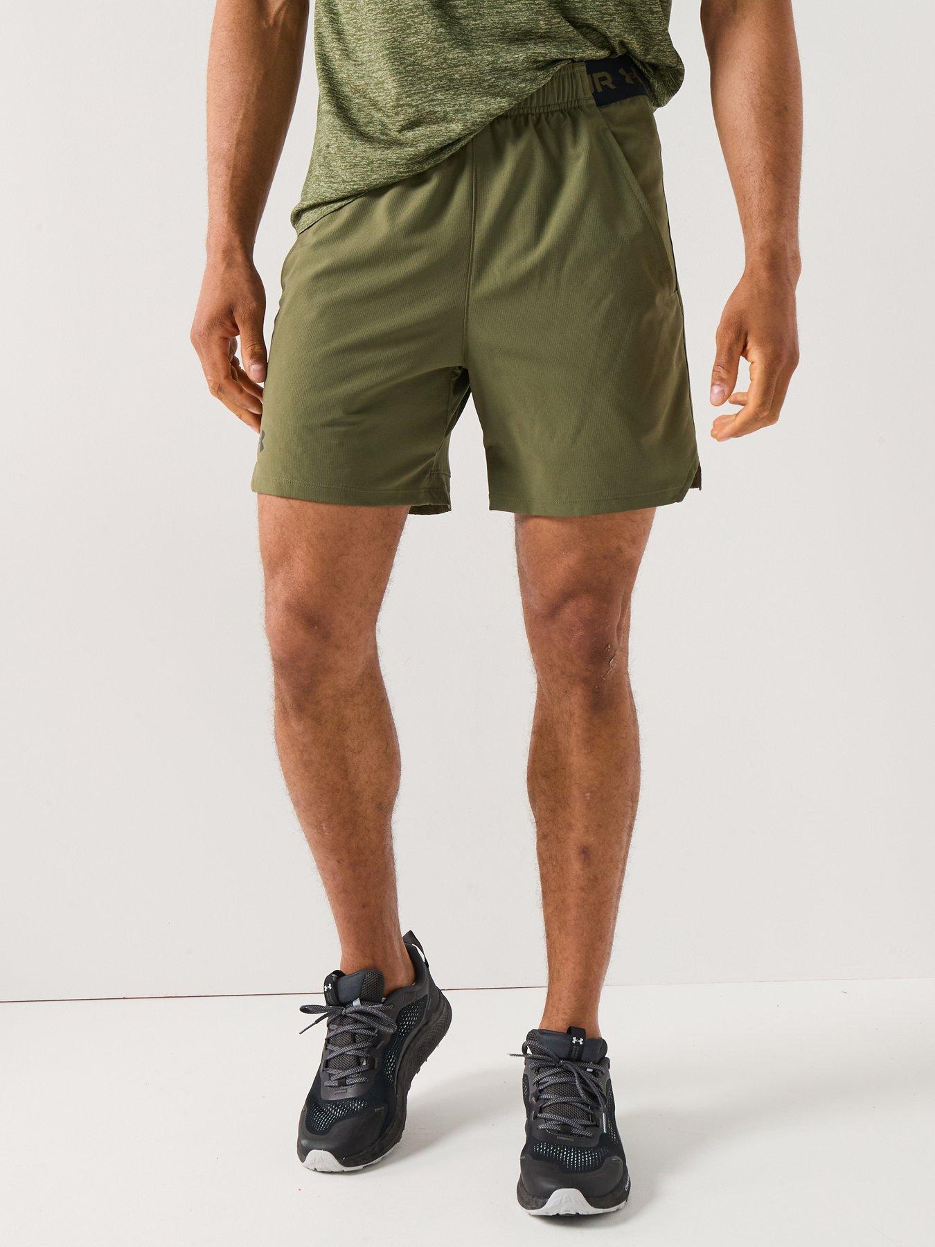 front image of under-armour-mens-training-vanish-woven-6in-shorts-green