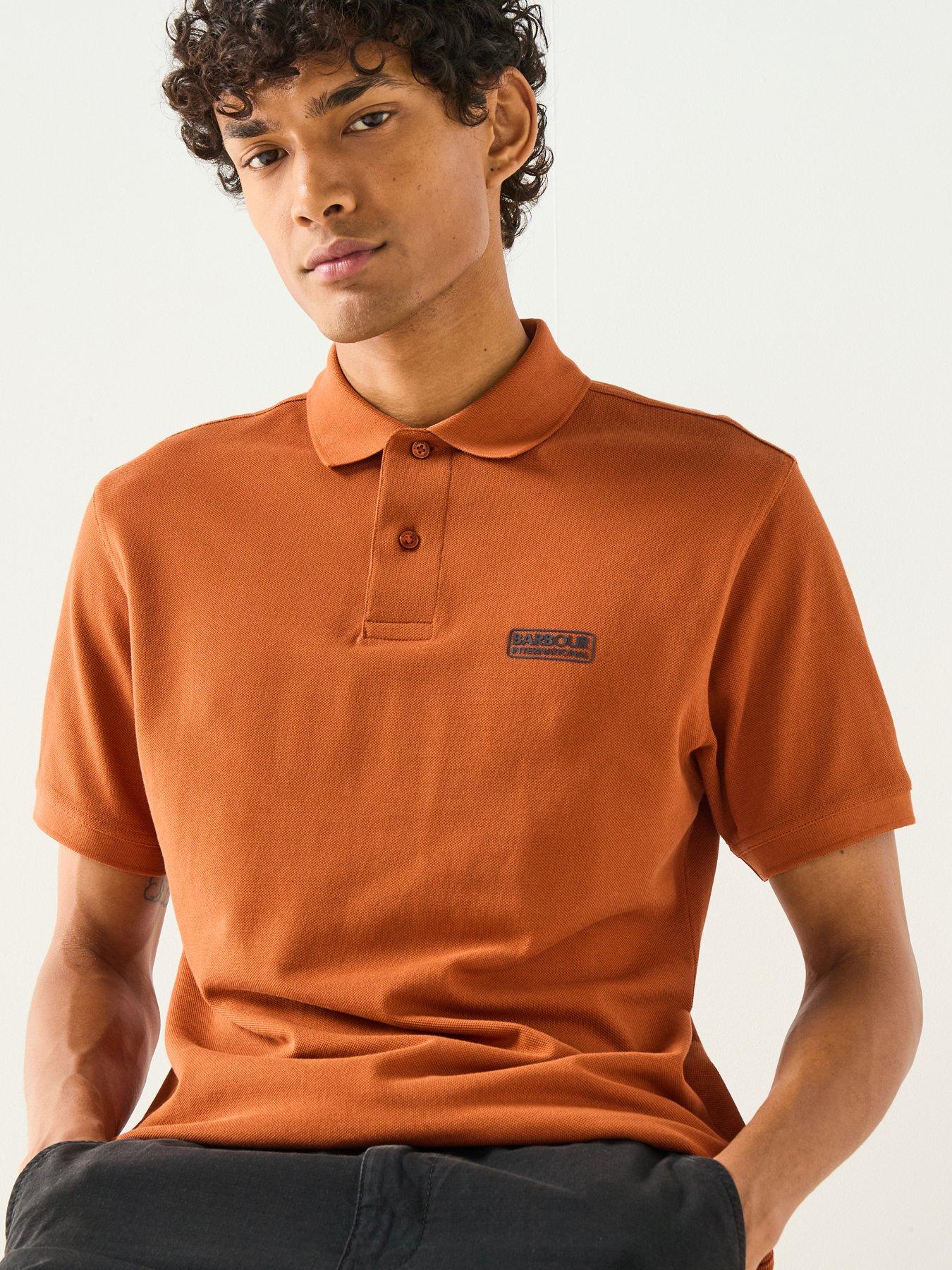 front image of barbour-international-essential-short-sleeve-polo-shirt--dark-orange