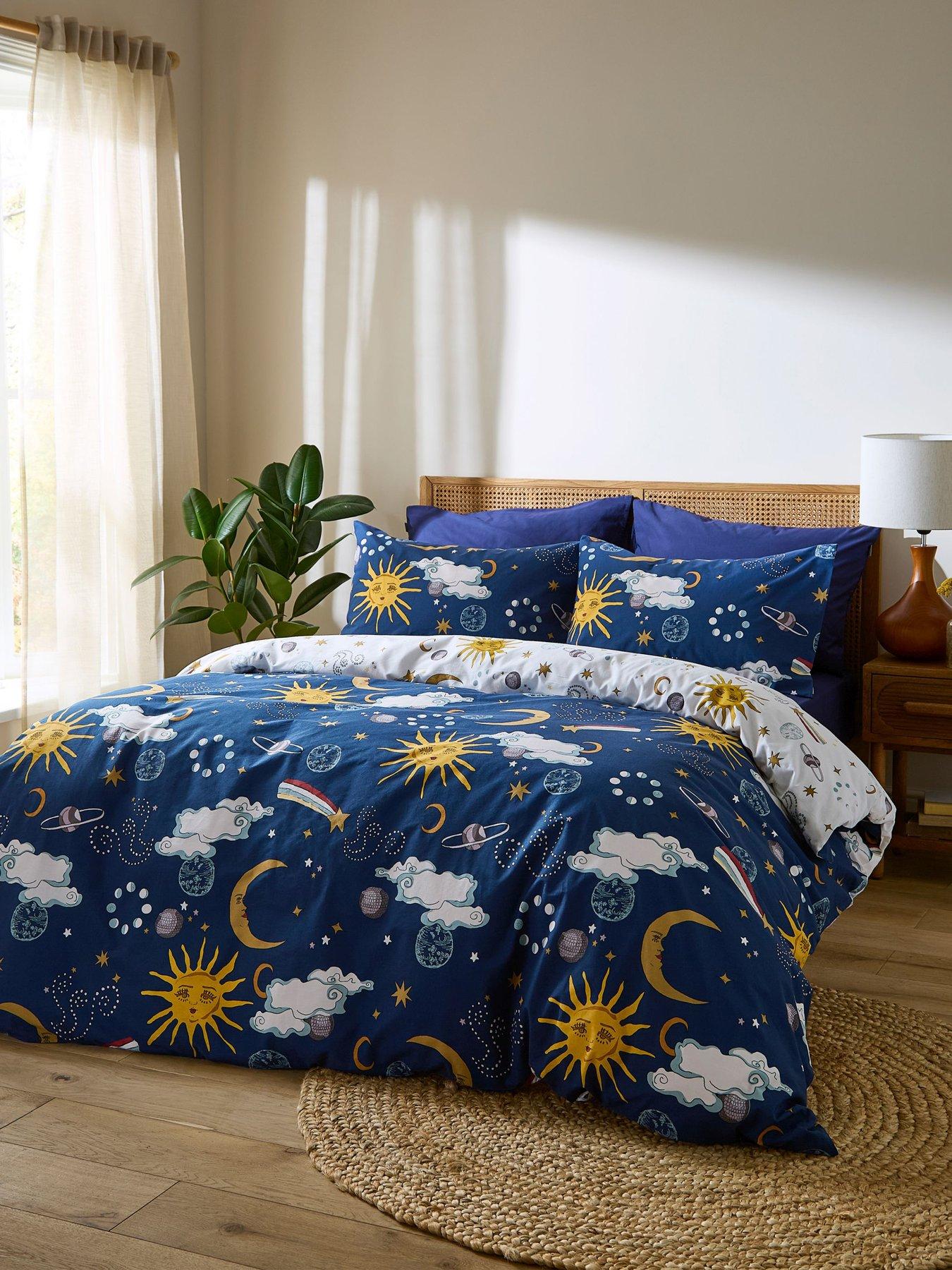 front image of their-nibs-disco-space-100-cotton-reversible-duvet-set-navy-blue