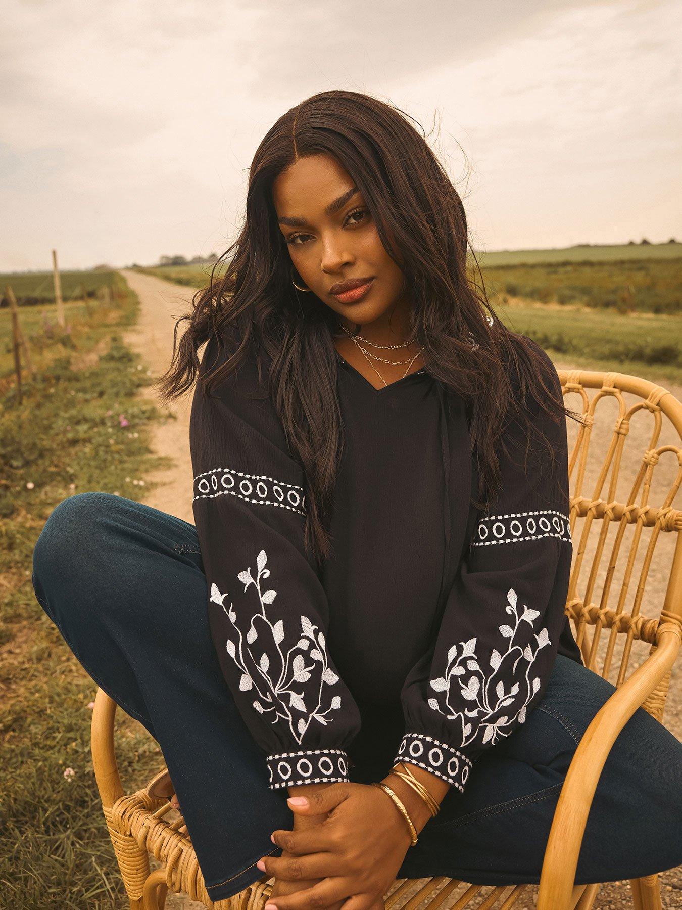undefined Curve Embroidered Sleeve Gypsy Top - Black