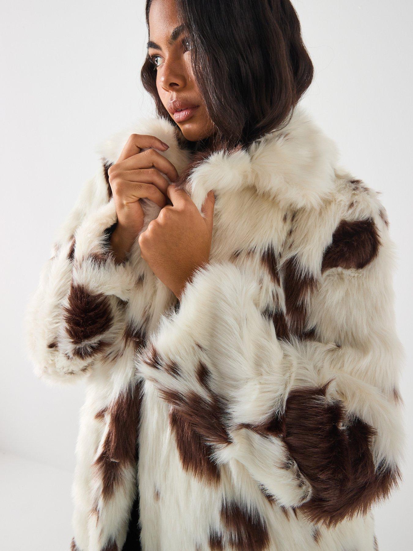  image of vero-moda-faux-fur-cow-print-coat-print