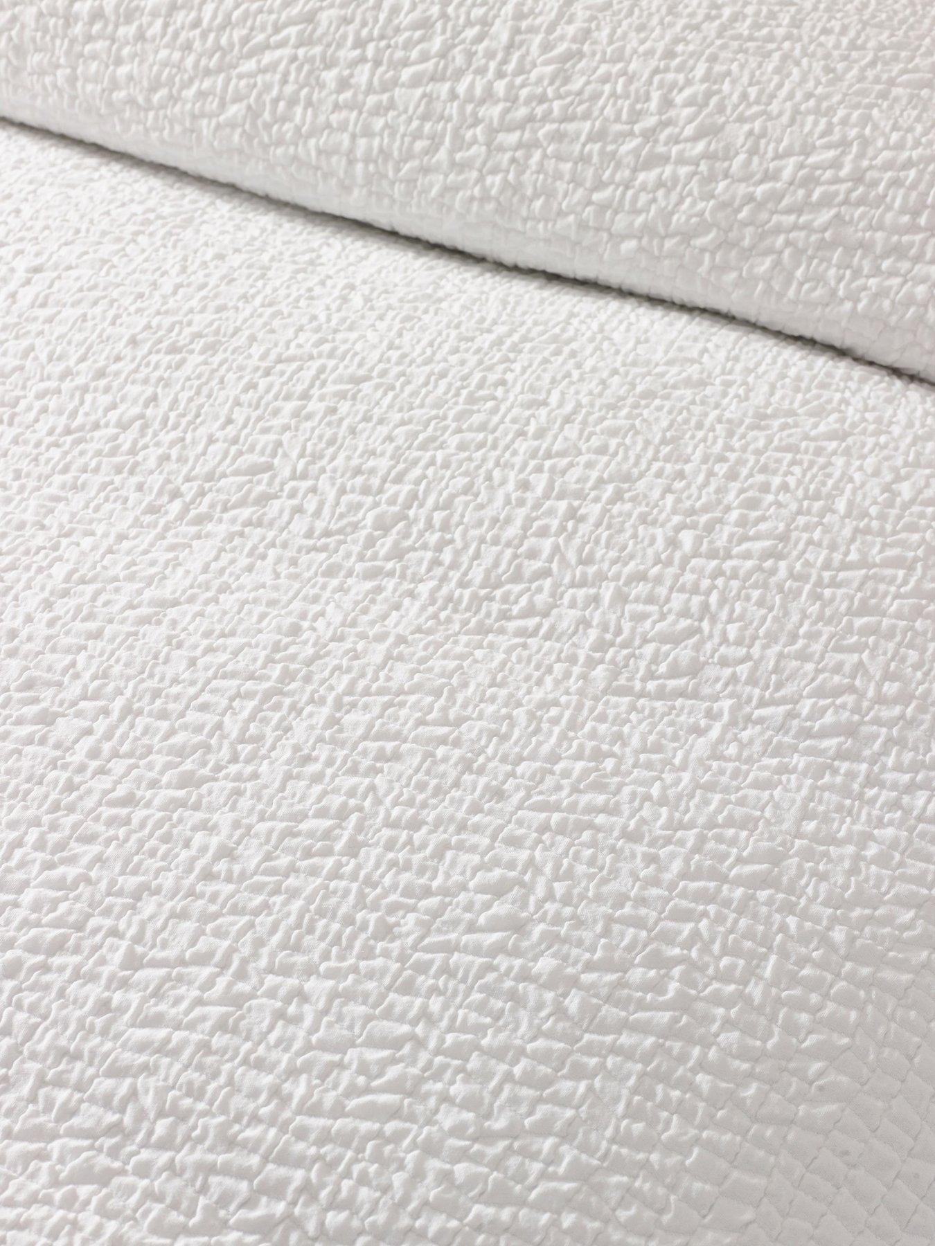  image of catherine-lansfield-crinkle-texture-duvet-set-white