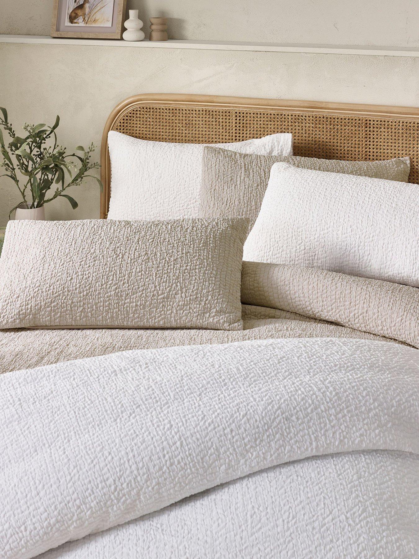  image of catherine-lansfield-crinkle-texture-duvet-set-white