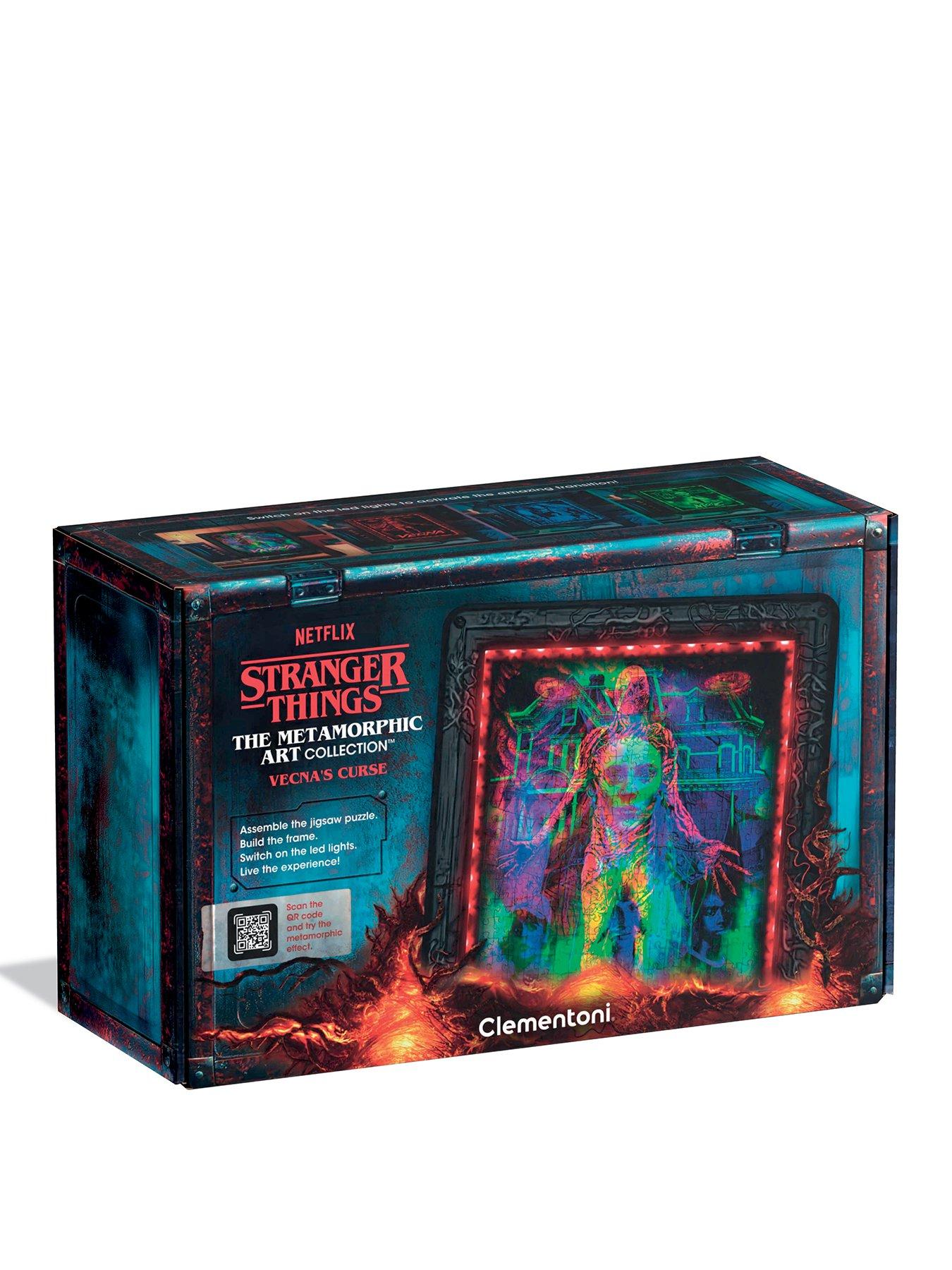  image of clementoni-stranger-things-ndash-vecnas-curse-ndash-520-piece-jigsaw-puzzle-with-metamorphic-art-and-led-light-display