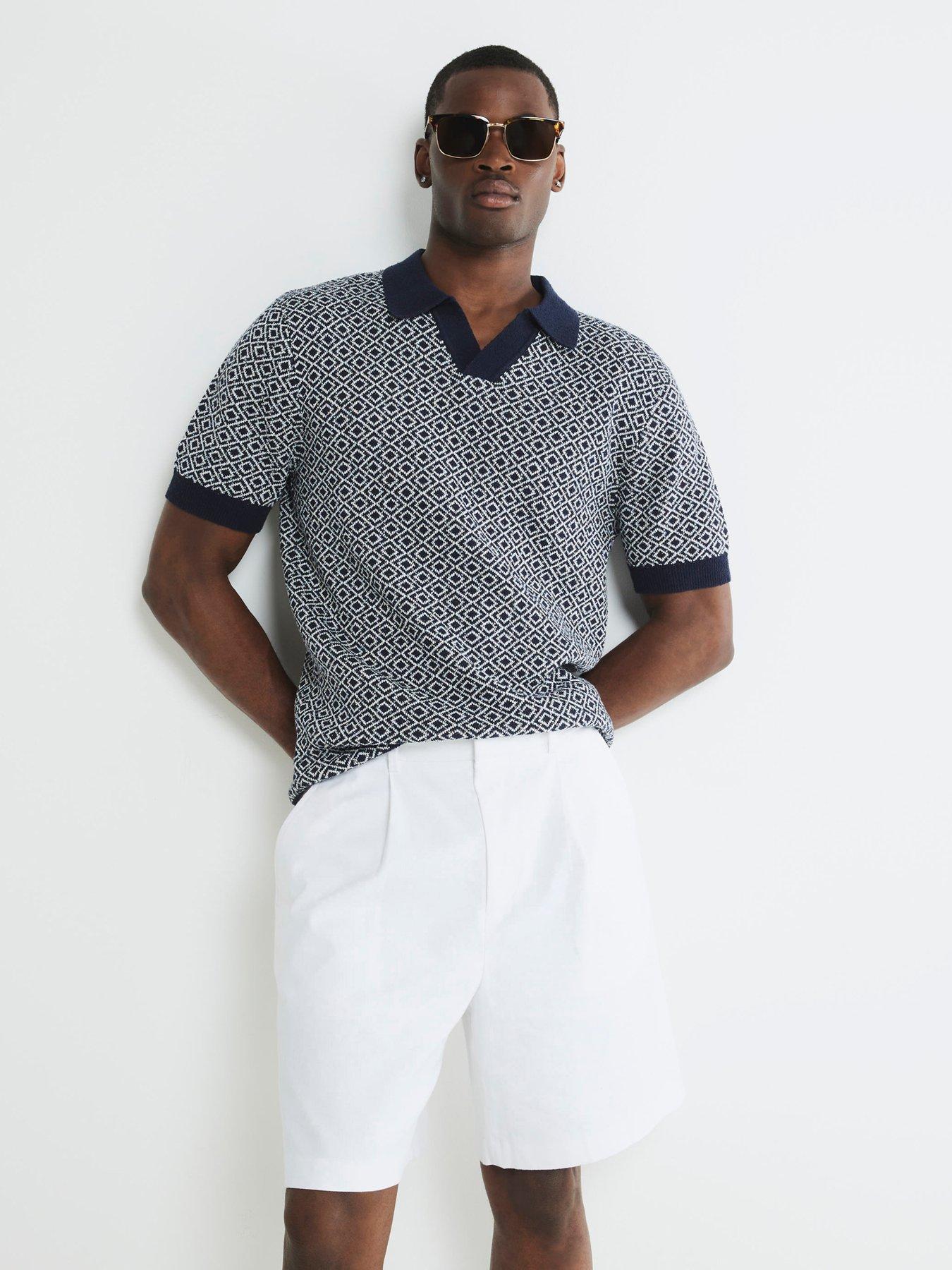 Image 1 of 4 of River Island Short Sleeve Geo Pattern Boucle Knitted Polo Shirt - Navy