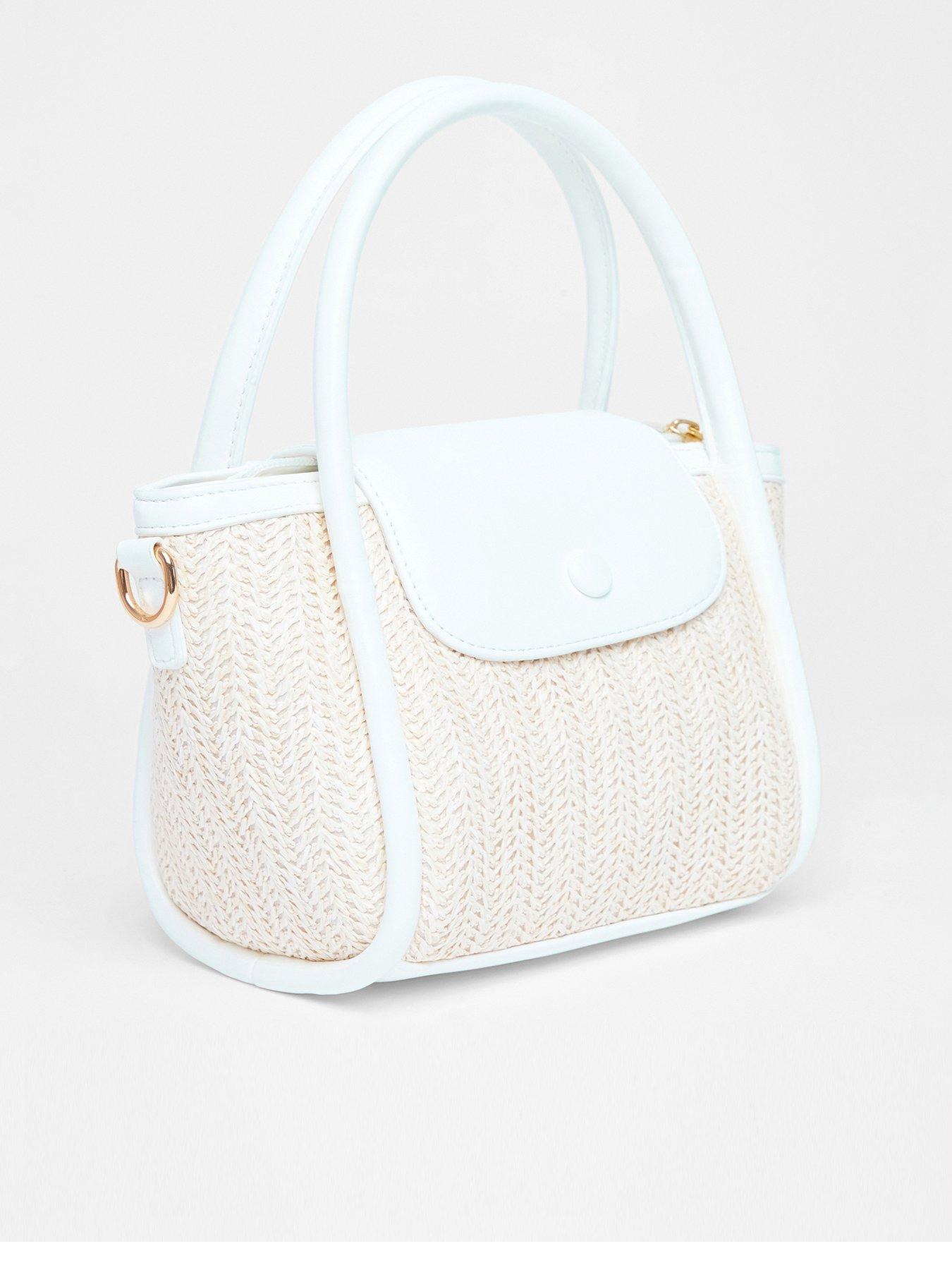 back image of quiz-white-woven-top-handle-bag