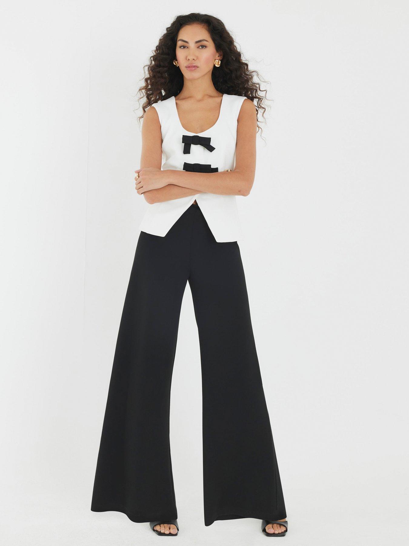 undefined Short Bow Hybrid Jumpsuit - Black