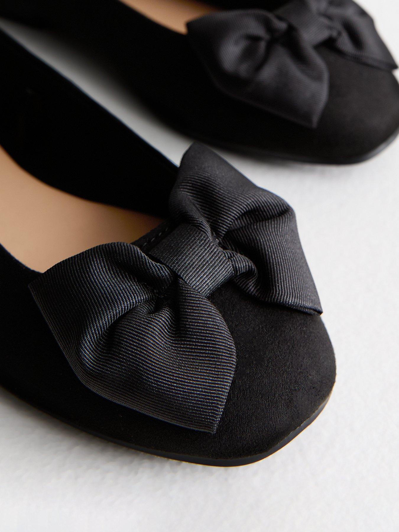 Image 4 of 6 of New Look Wide Fit Black Faux Suede Bow Detail Ballet Flats