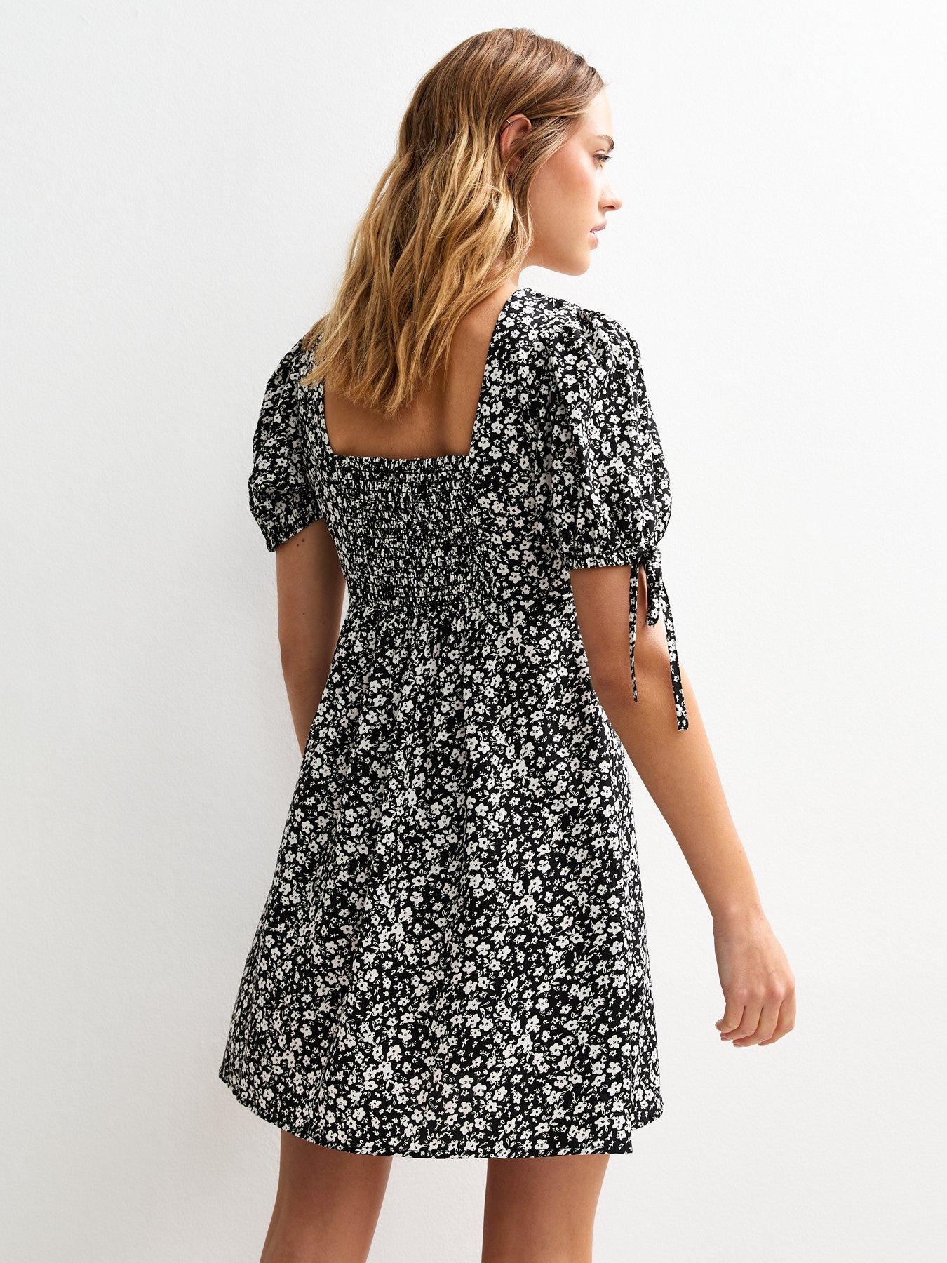 Image 2 of 5 of New Look Black Daisy Print V-neck Mini Dress
