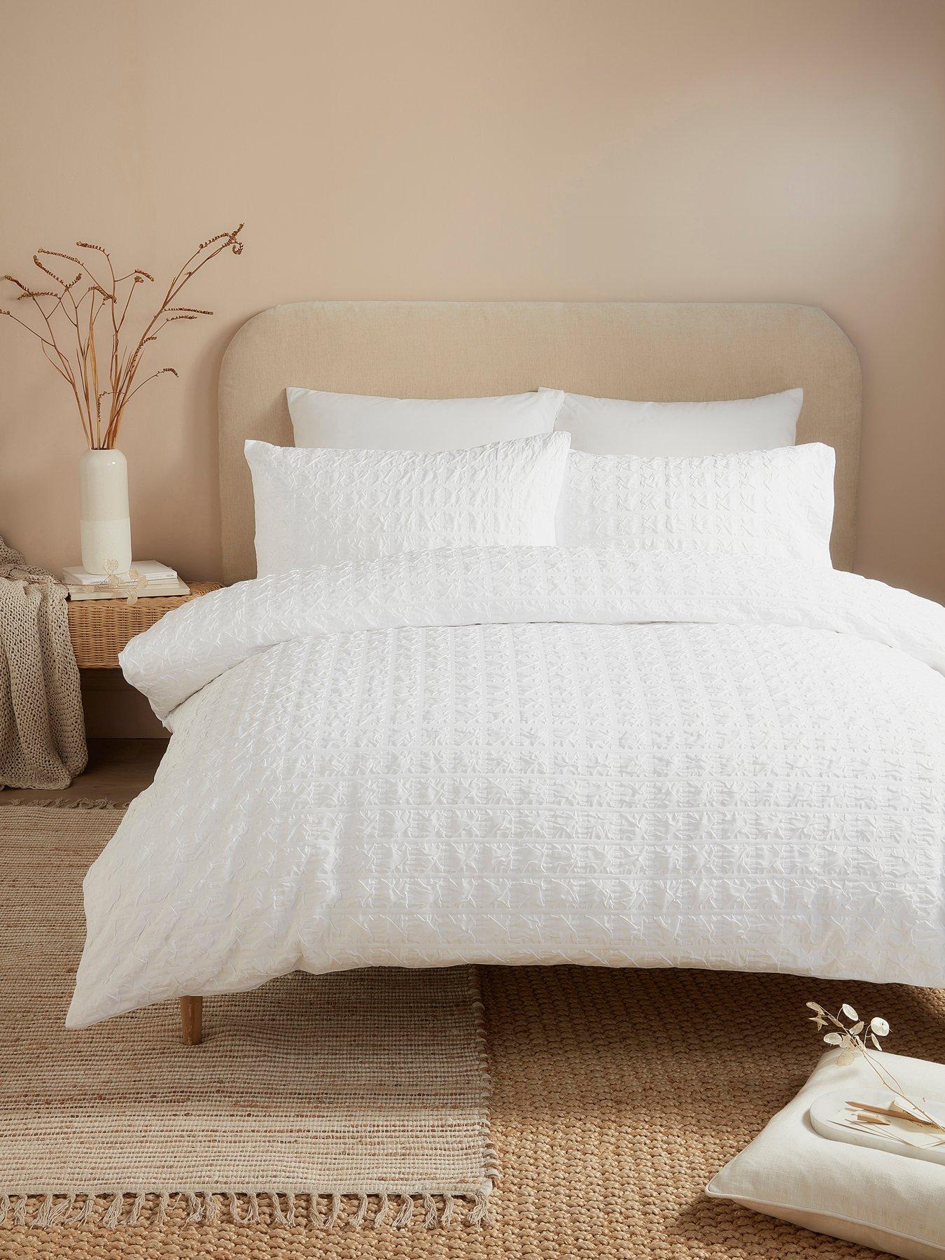 Image 1 of 3 of Serene Embossed Grid -textured Double Duvet Cover Set