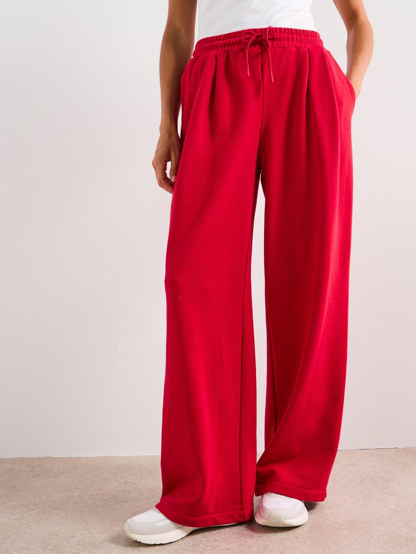 front image of sweaty-betty-womens-training-revive-track-pant-red