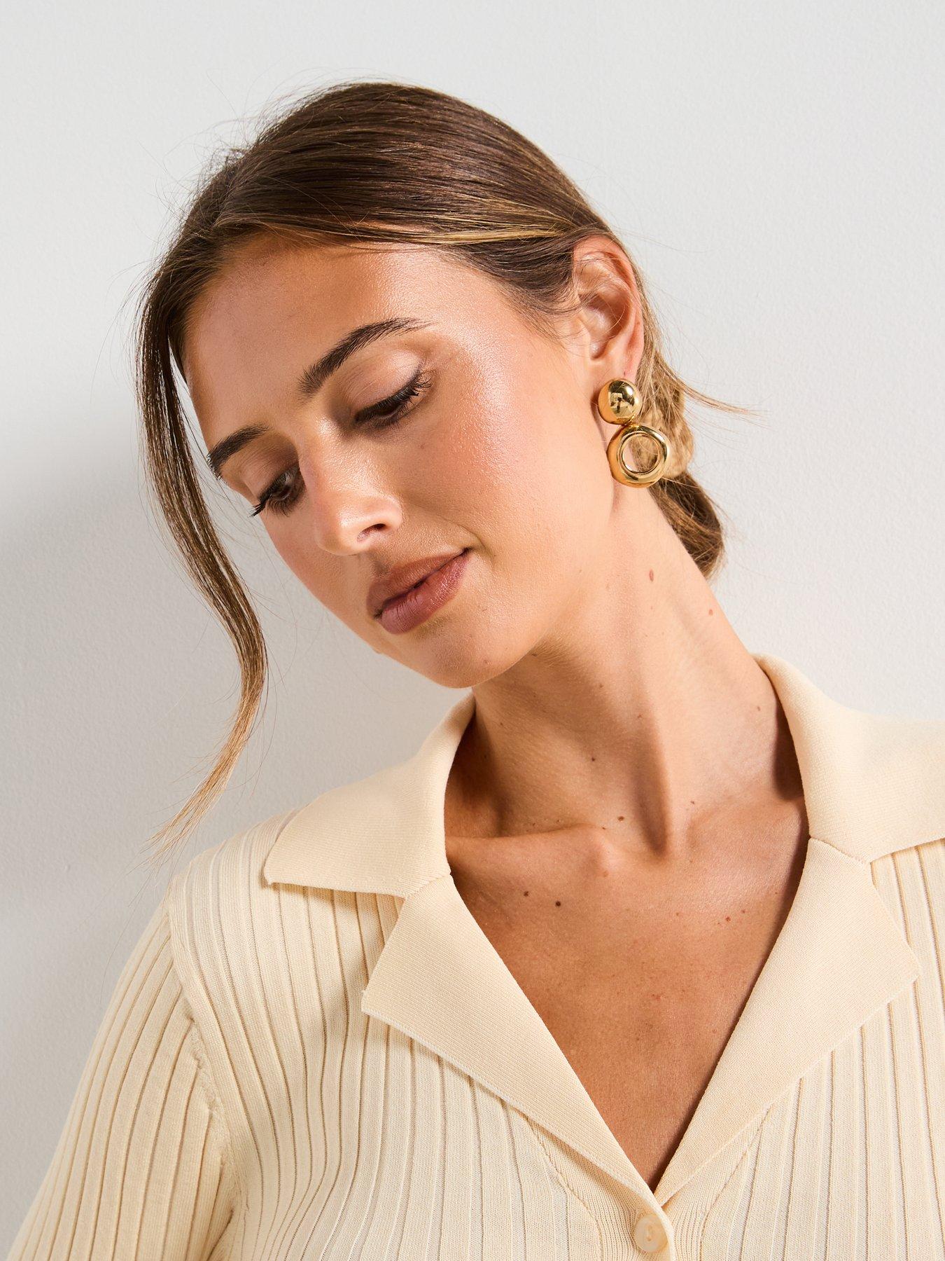  image of mango-ribbed-lapel-cardigan-cream