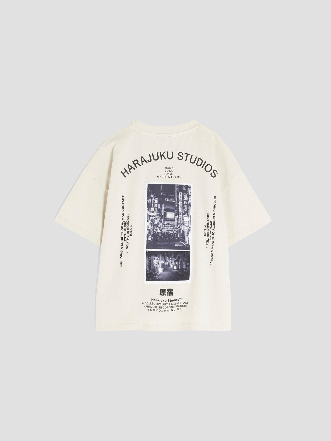 Image 1 of 4 of River Island Older Boys Harajuku Studios Backprint T-shirt - Beige