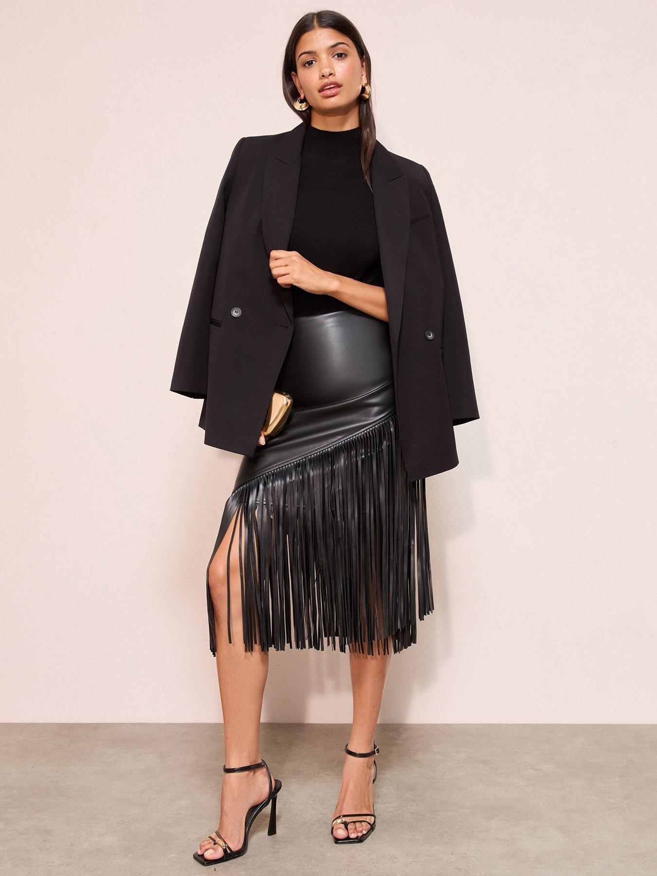 image of friends-like-these-pu-tassel-midi-skirt-black