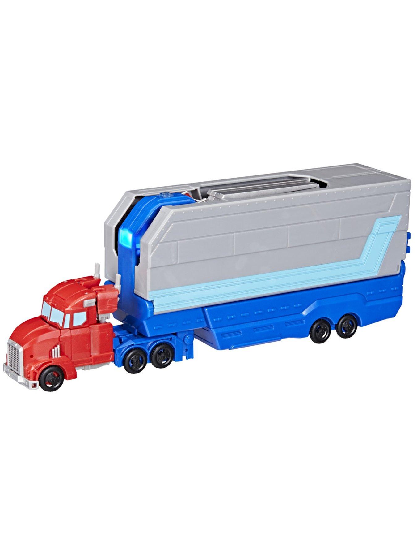  image of transformers-earthsparknbspoptimus-prime-battle-trailer-playset