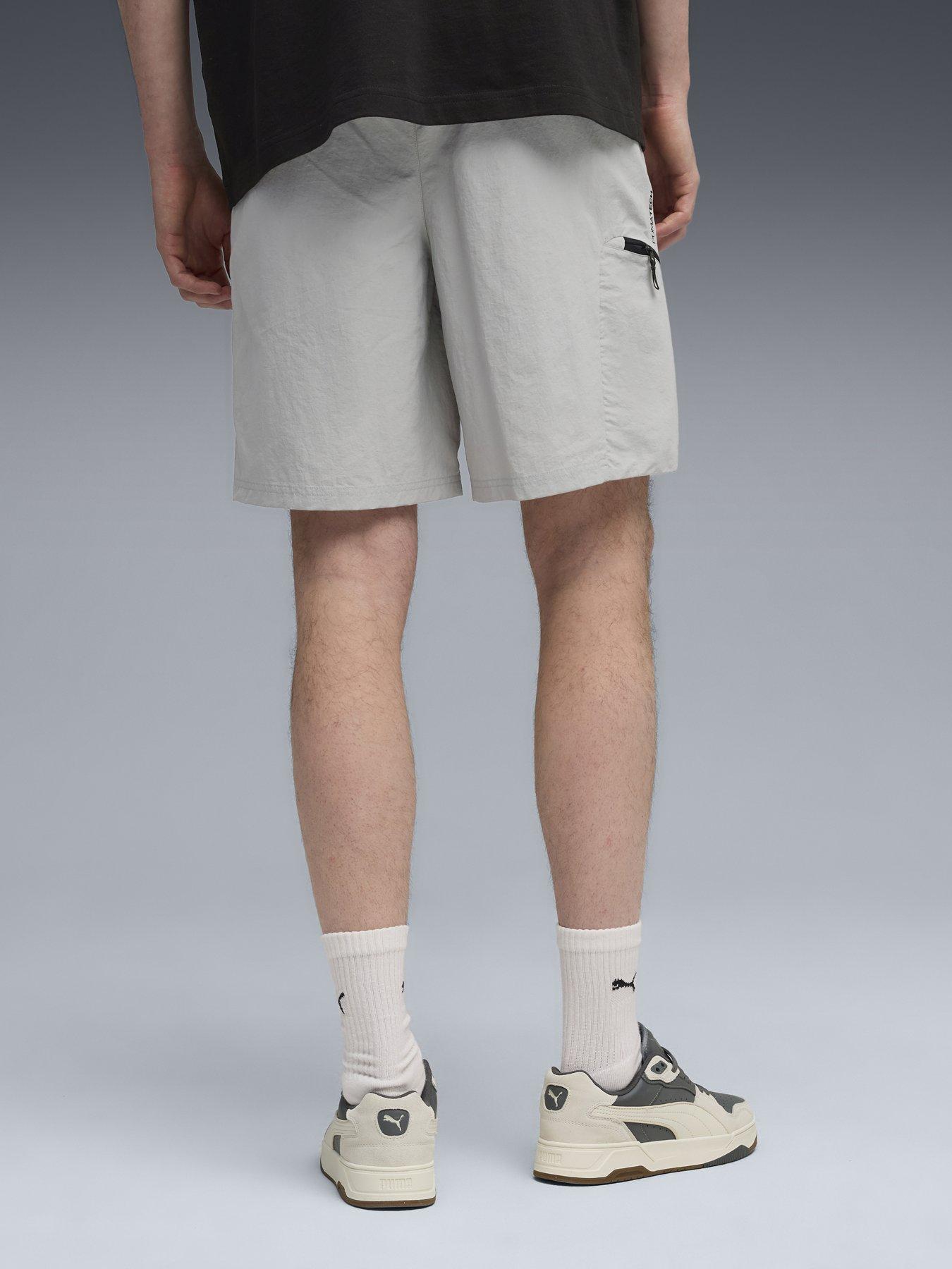 stillFront image of puma-mens-pumatech-woven-shorts-grey