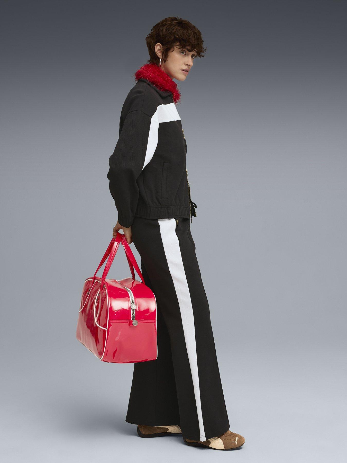  image of puma-womens-t7-flared-pants-black