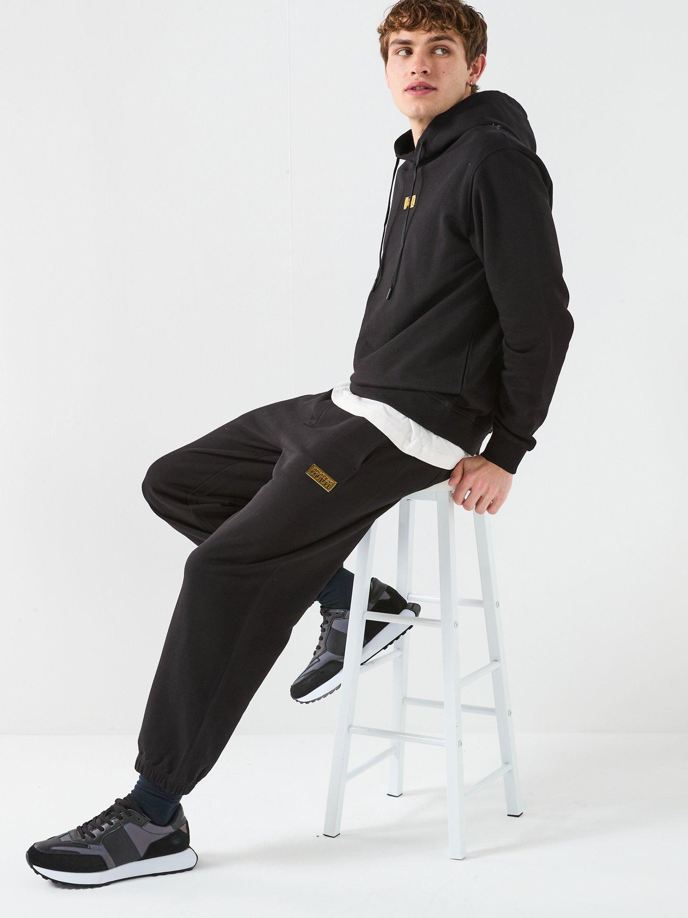  image of versace-jeans-couture-metal-placket-joggers-black