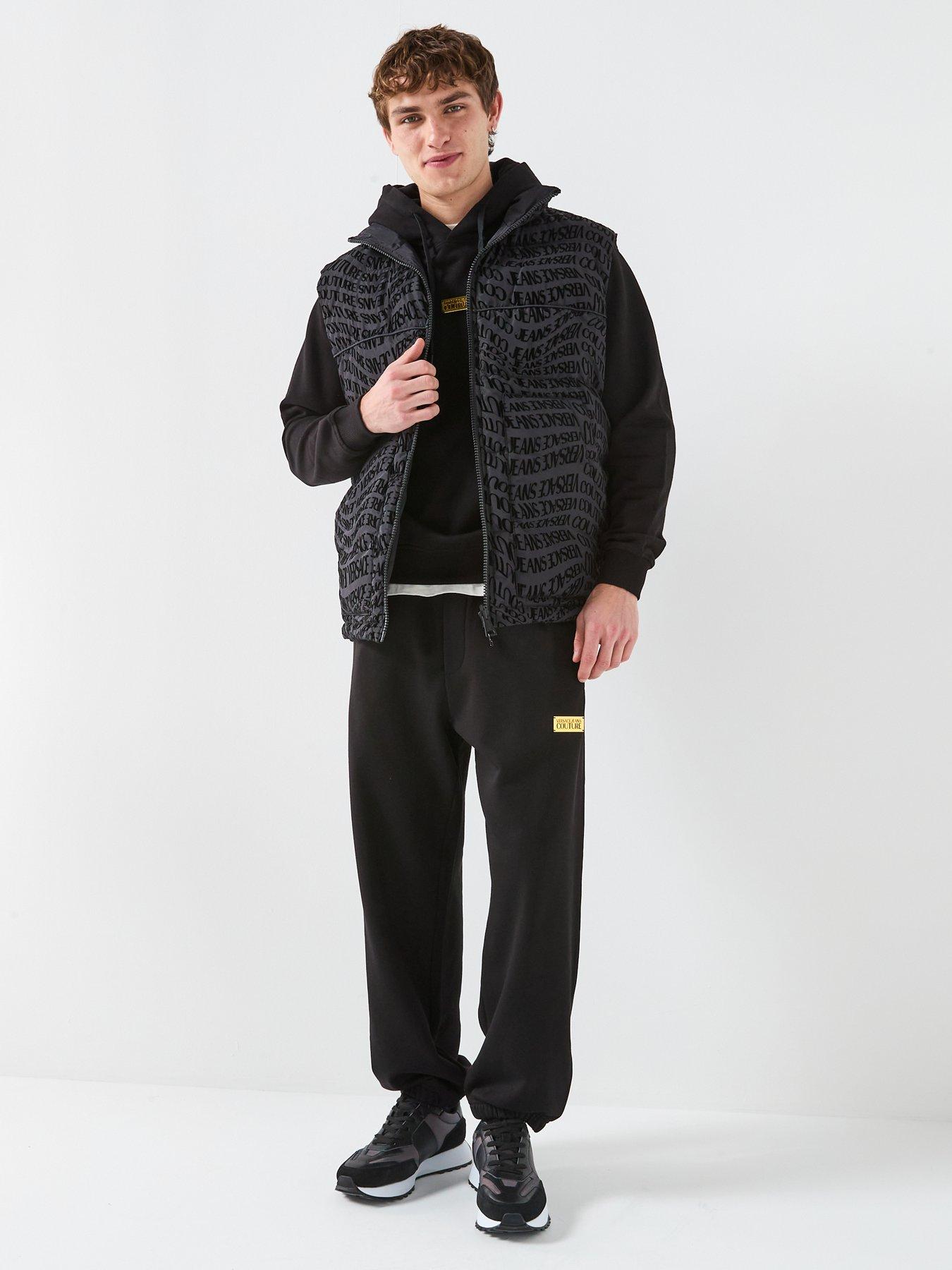  image of versace-jeans-couture-all-over-liquify-reversible-gilet-black