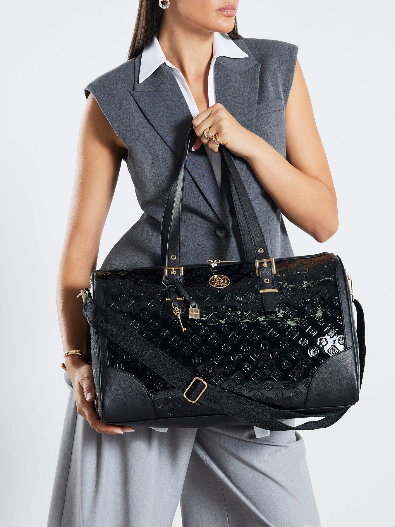 Image 1 of 6 of River Island Patent Monogram Charm Holdall - Black