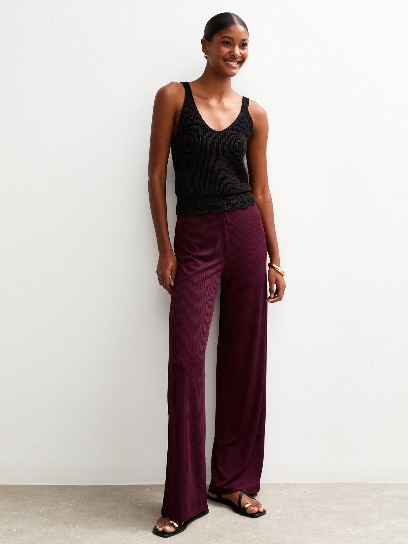 front image of new-look-dark-burgundy-ribbed-wide-leg-trousers-red