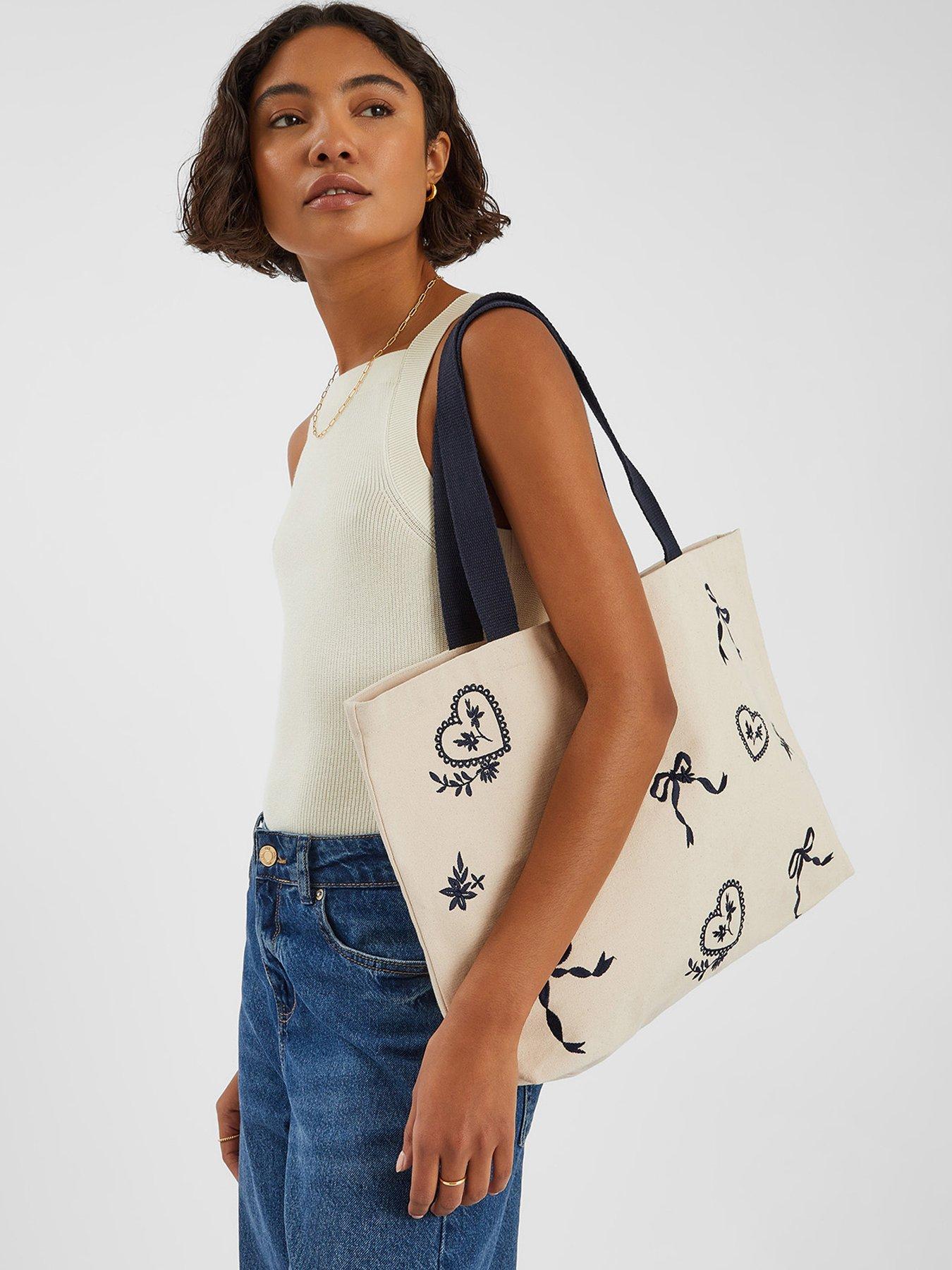 Image 2 of 5 of Accessorize Bow Embroidered Shopper Bag - Cream