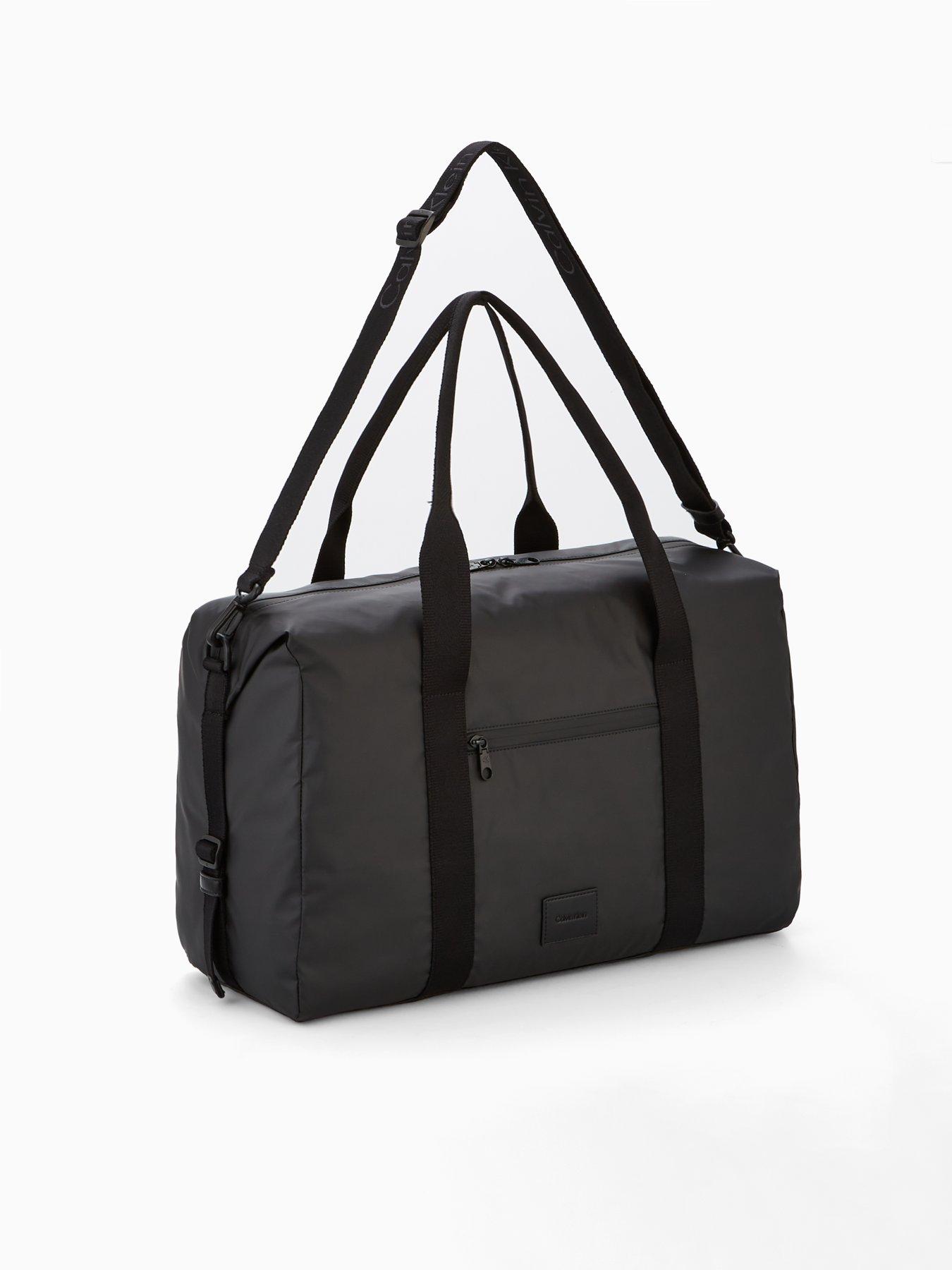  image of calvin-klein-puff-utility-duffle-bag-black