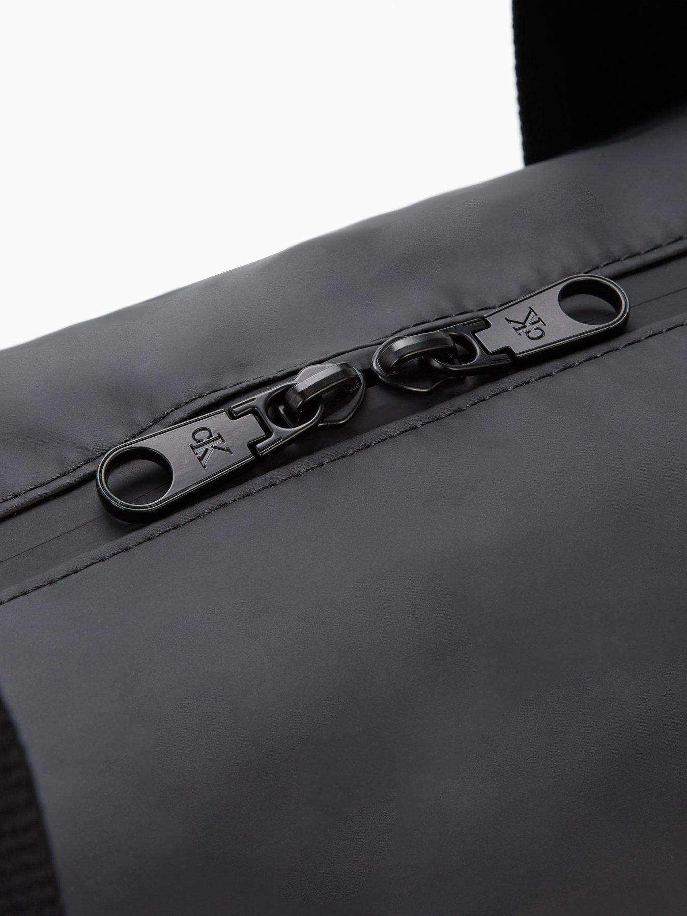  image of calvin-klein-puff-utility-duffle-bag-black