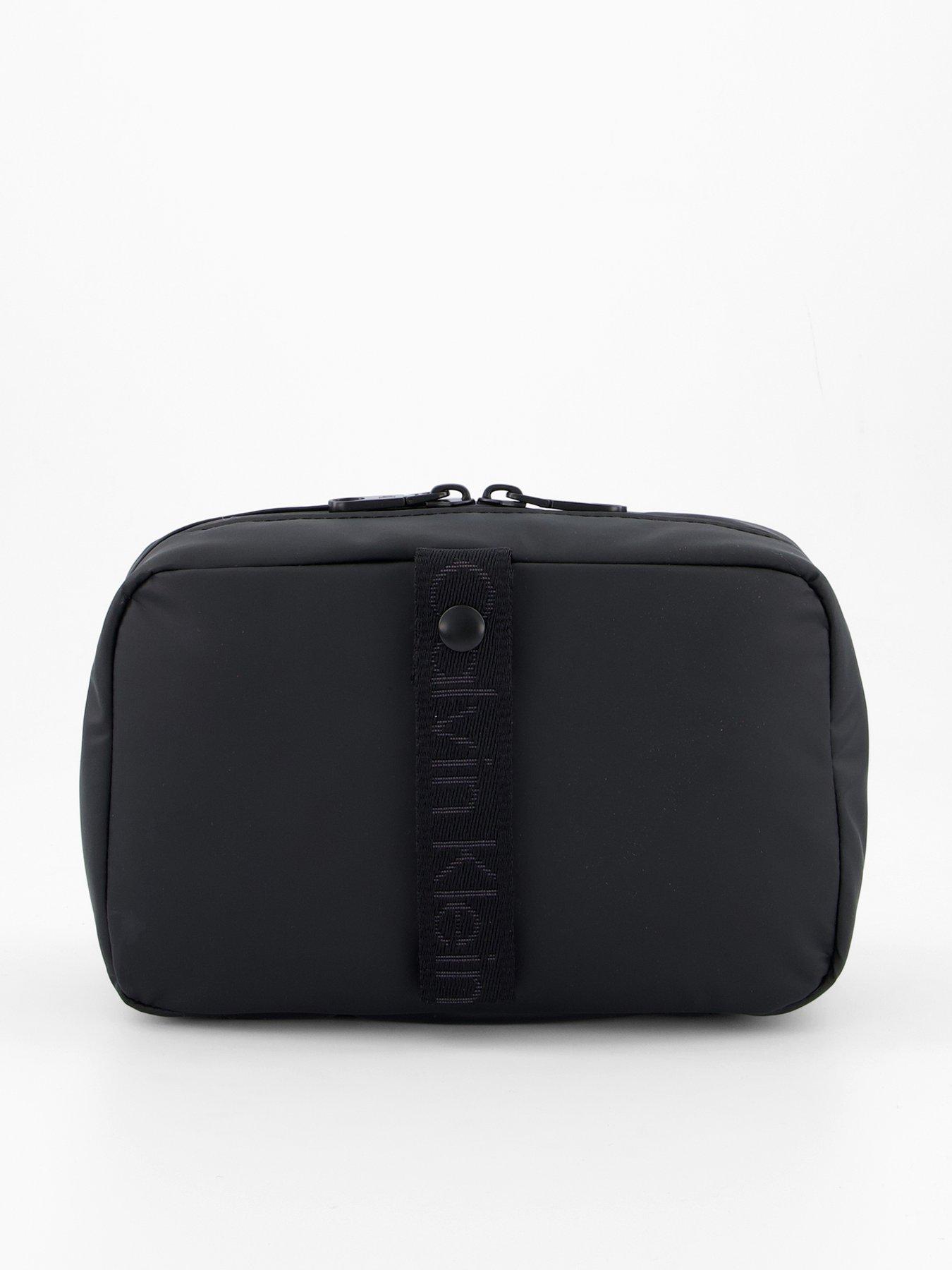 front image of calvin-klein-puff-utility-hanger-washbag-black