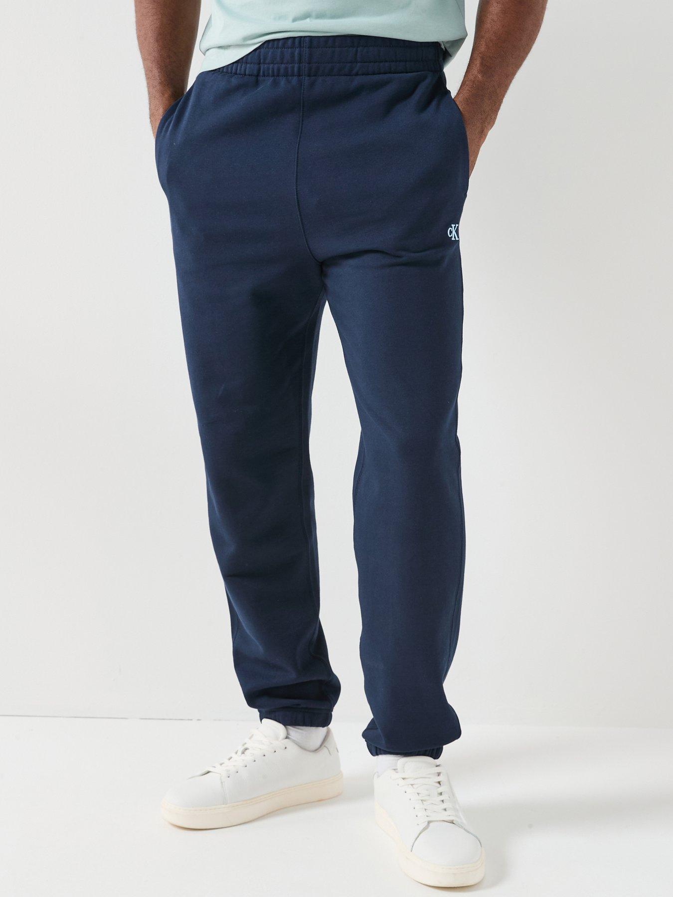 Image 1 of 6 of Calvin Klein Jeans Terry Monogram Cuff Joggers - Navy