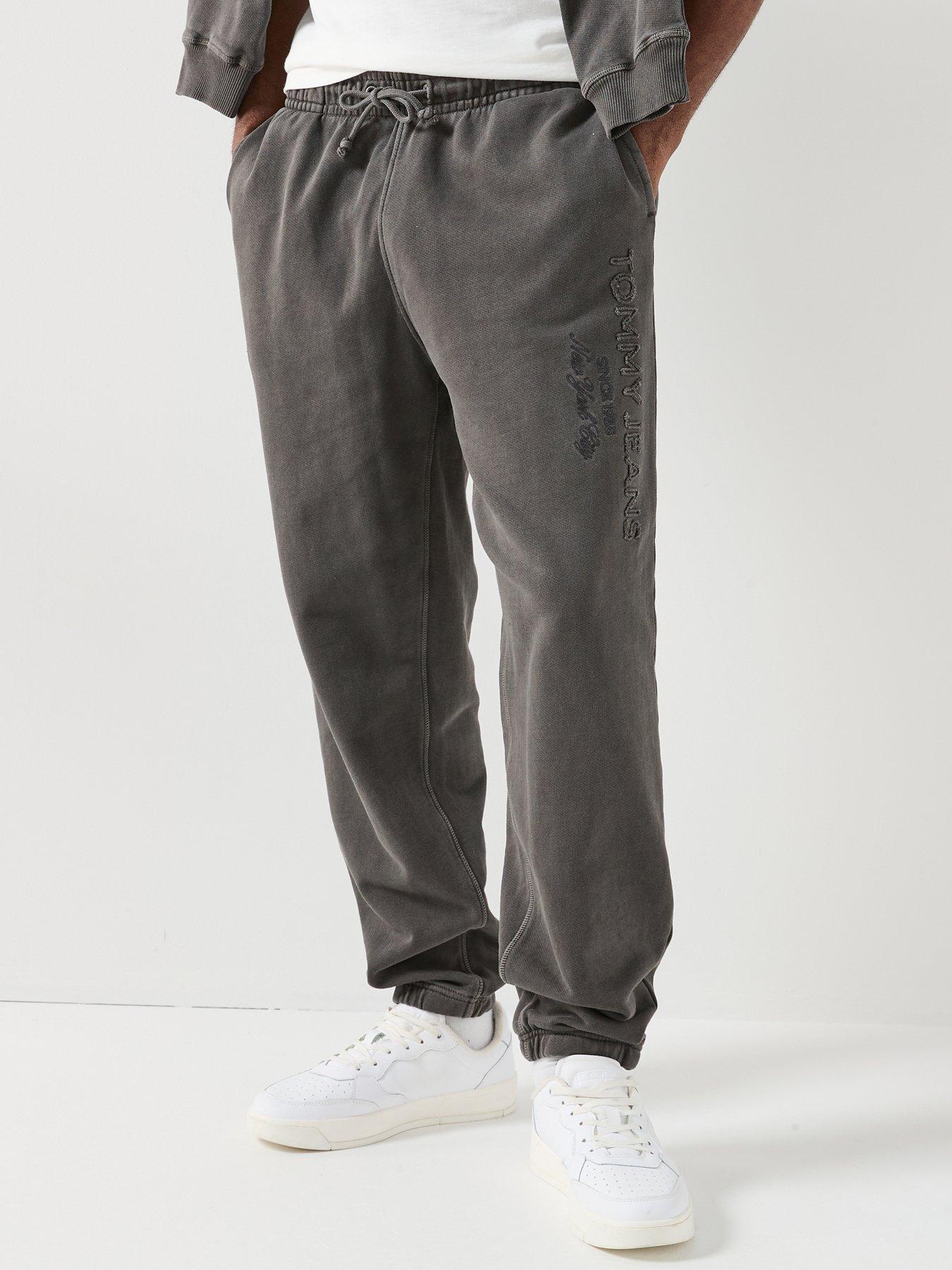 Image 1 of 6 of Tommy Jeans Relaxed Fit Garment Dyed Joggers - Black