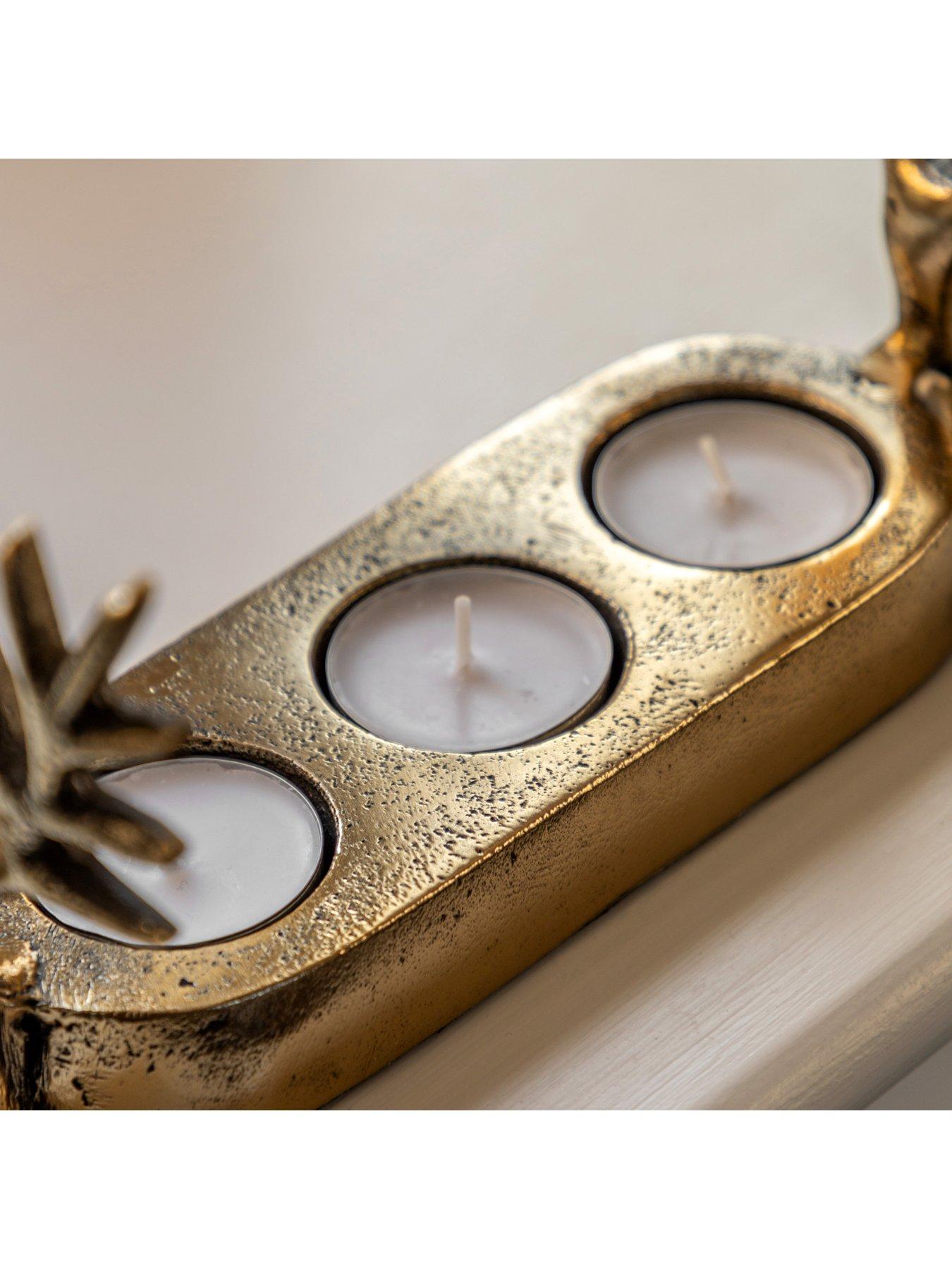  image of gallery-direct-reindeer-3-tea-light-holder-antique-gold