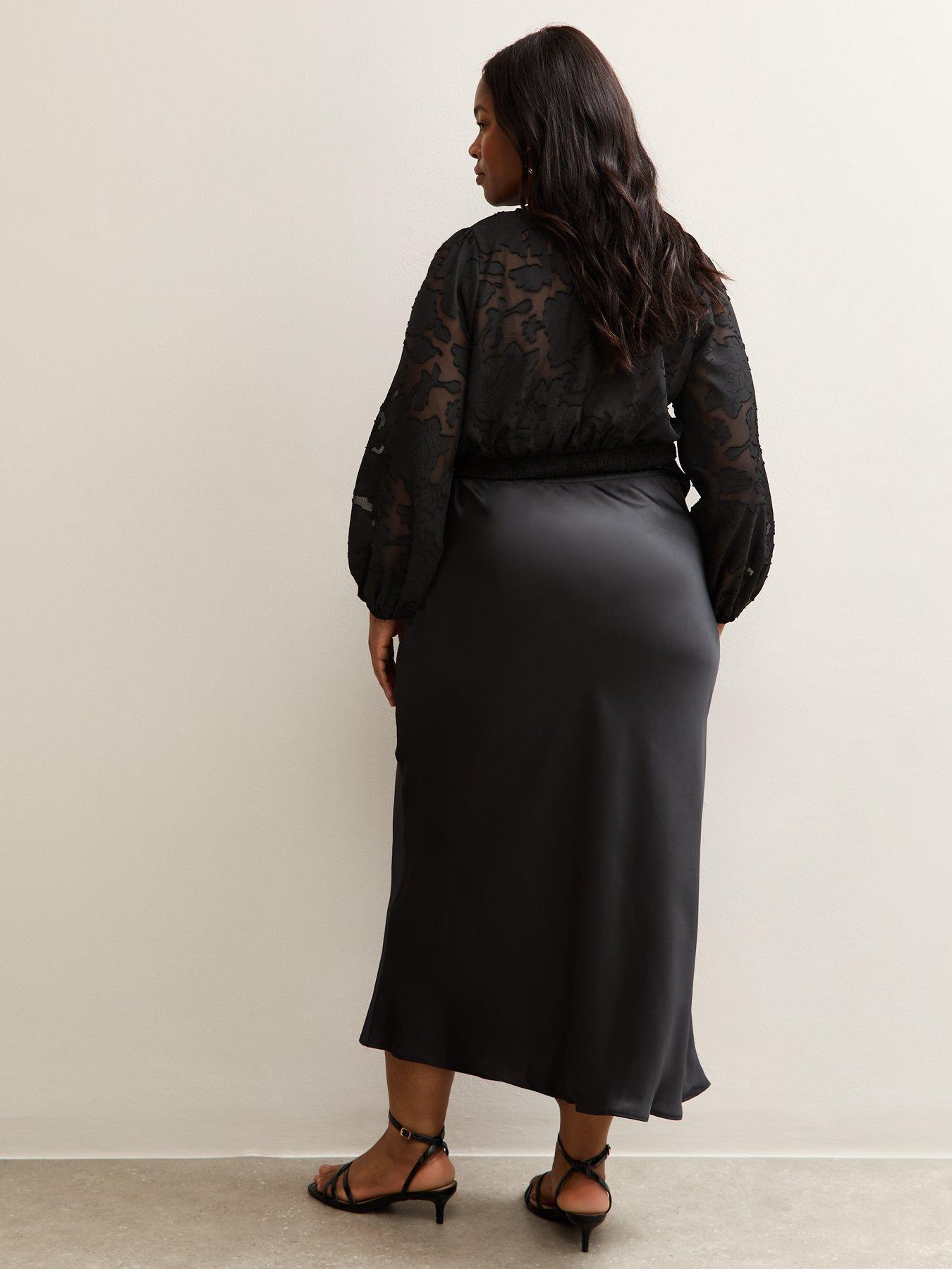 Image 2 of 4 of New Look Curves Satin Bias Cut Midi Skirt - Black