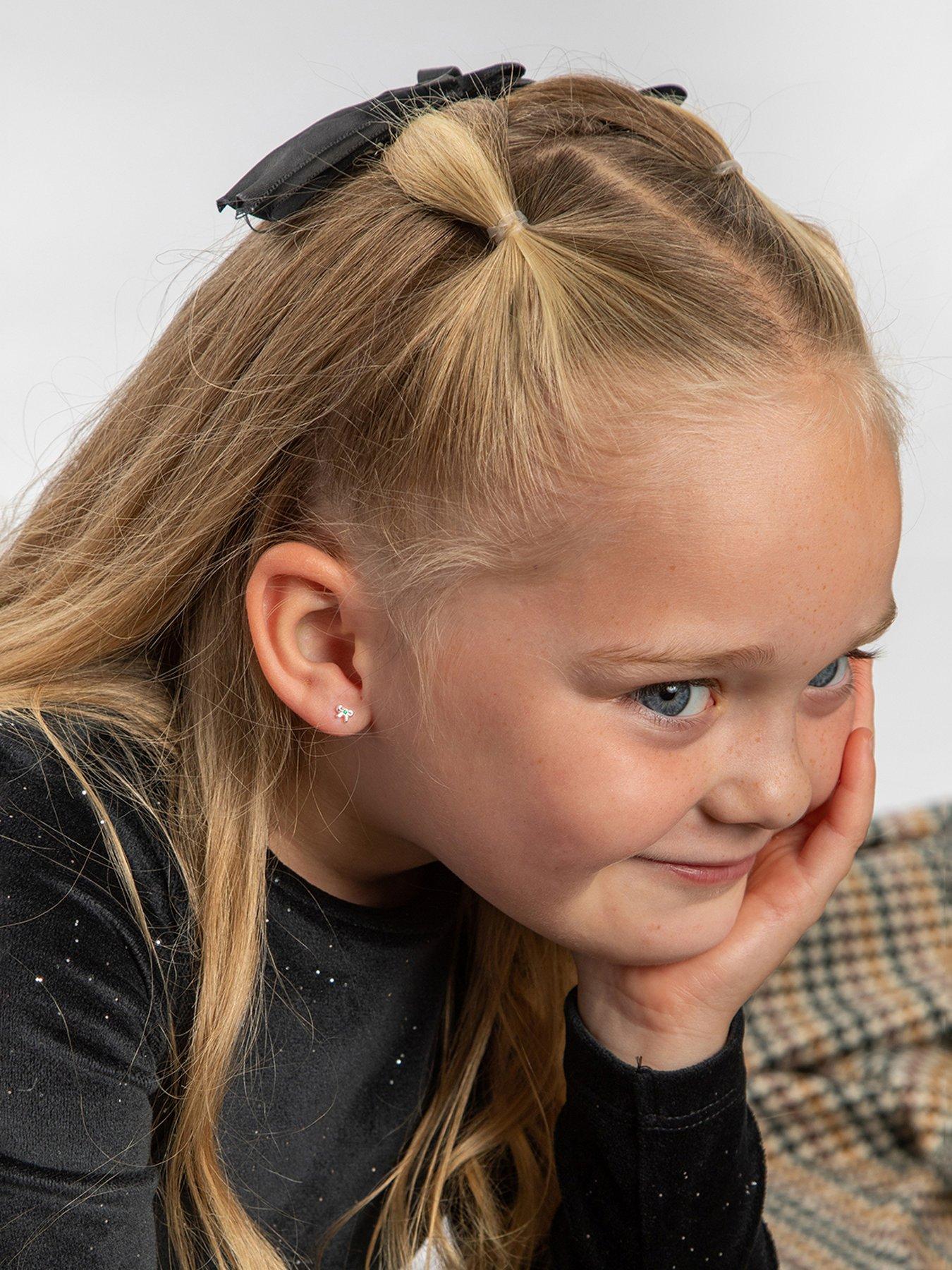  image of the-love-collection-sterling-silver-bow-cz-birthstone-stud-earrings